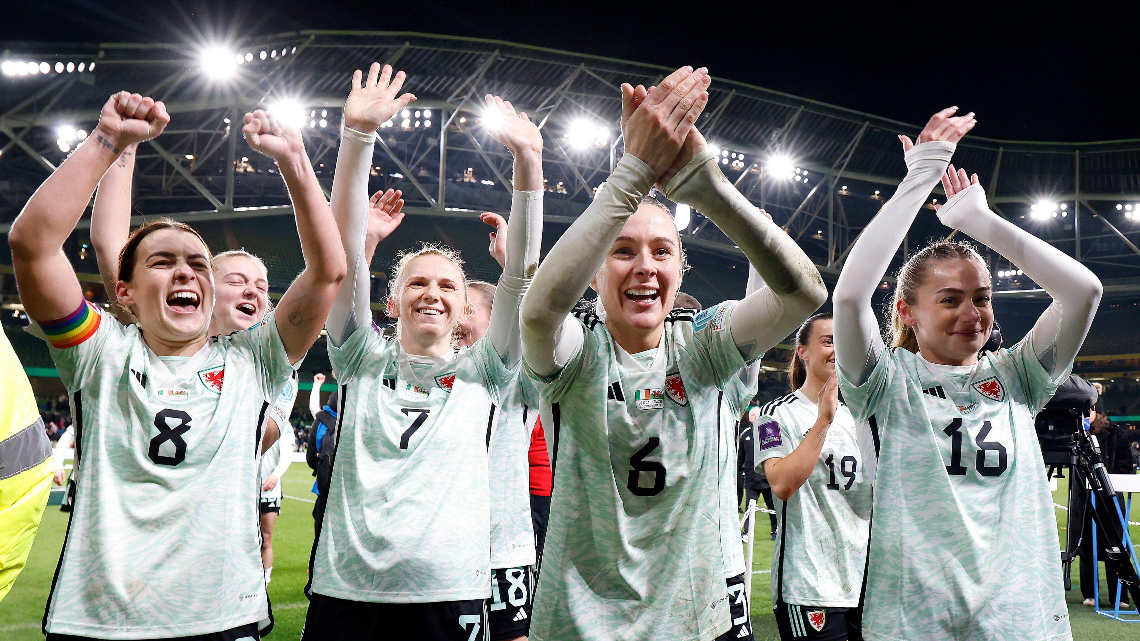 Wales players celebrating after the full time whistle