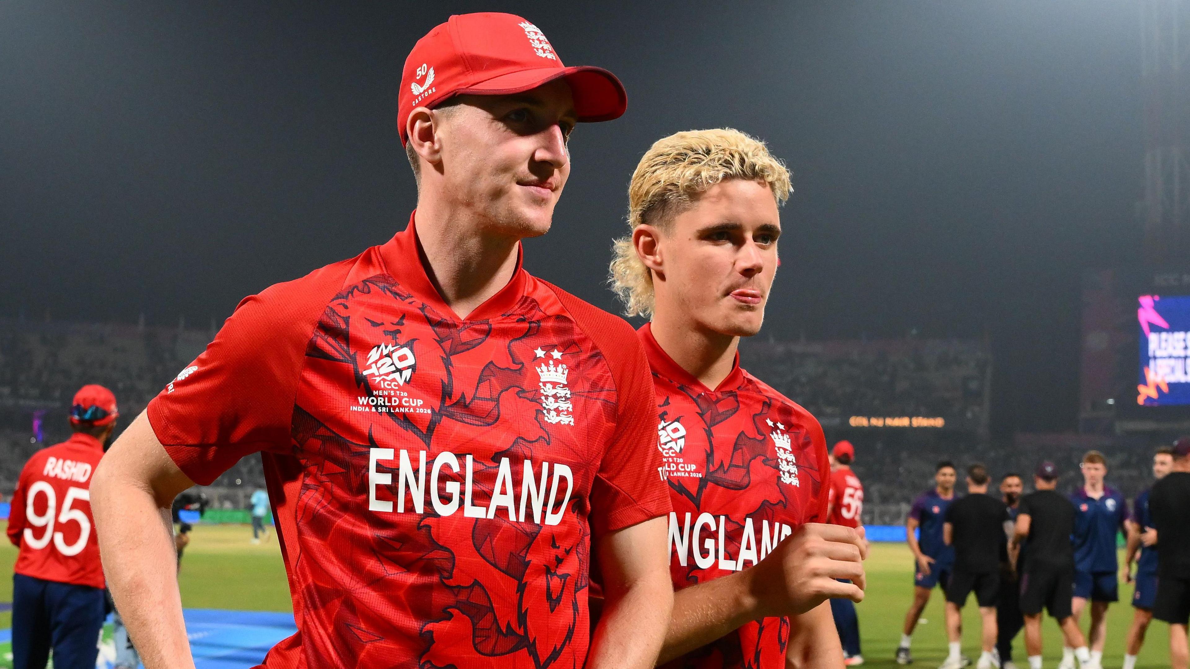Harry Brook and Jacob Bethell leave the field after the T20 World Cup match between England and Bangladesh