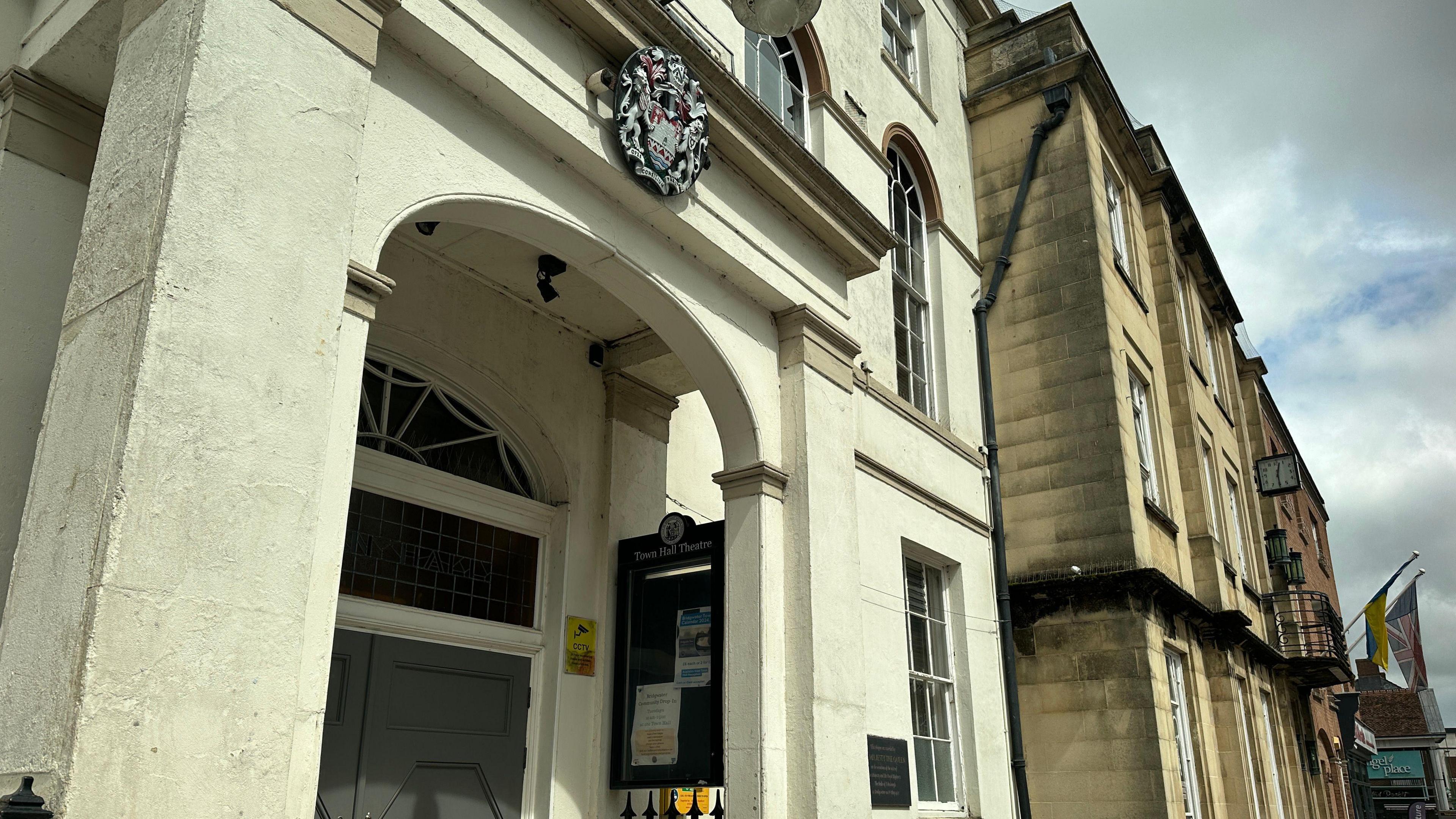 The entrance to Bridgwater Town Council's headquarters - a white building with a small archway