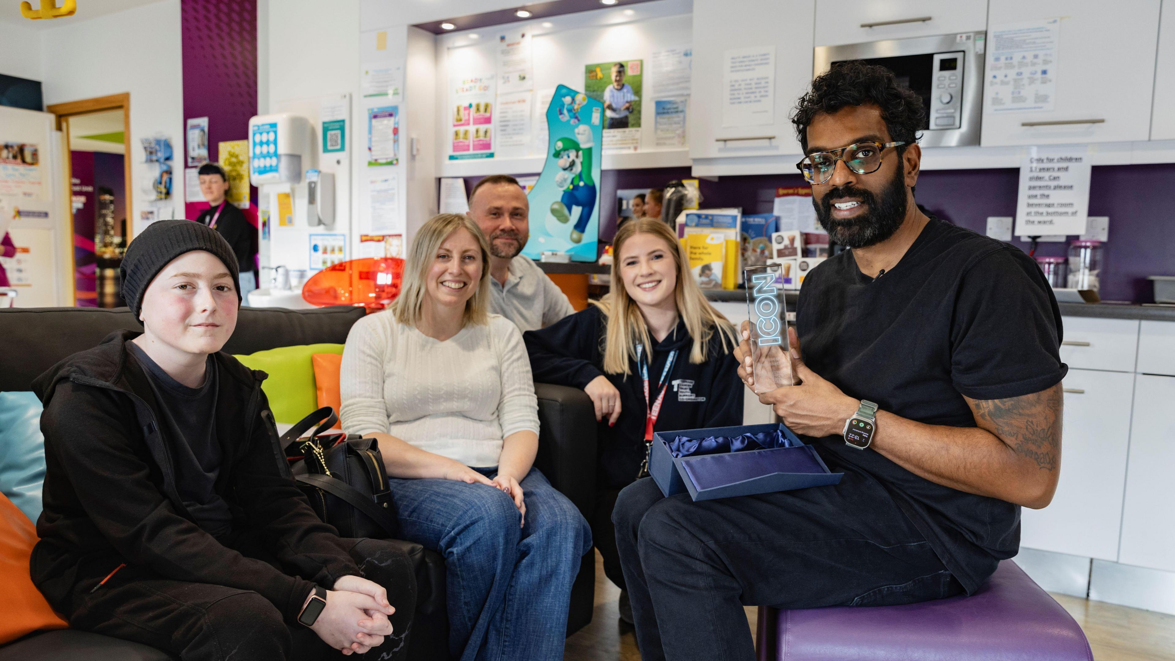 Logan, 13, mum Nicola, dad Jon and Faye Hindmarsh with Romesh Ranganathan.