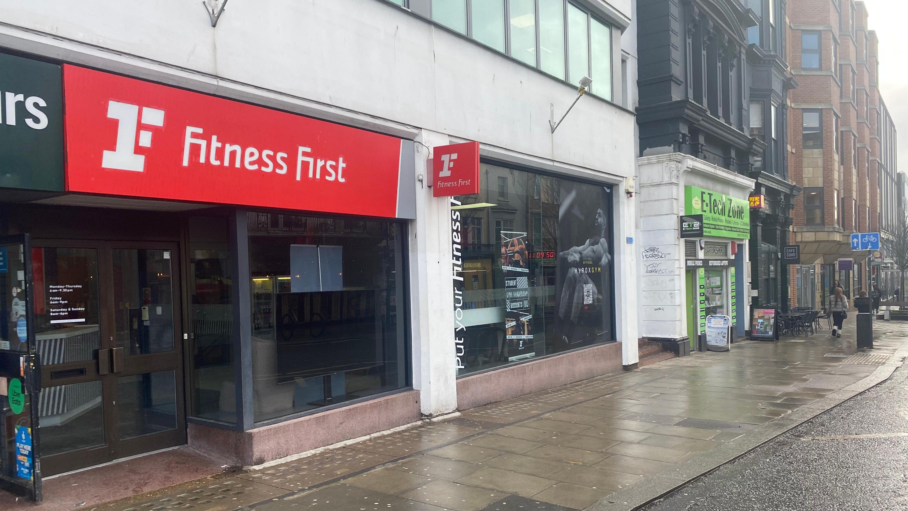 Exterior shot of Fitness First frontage in Brighton on a rainy day