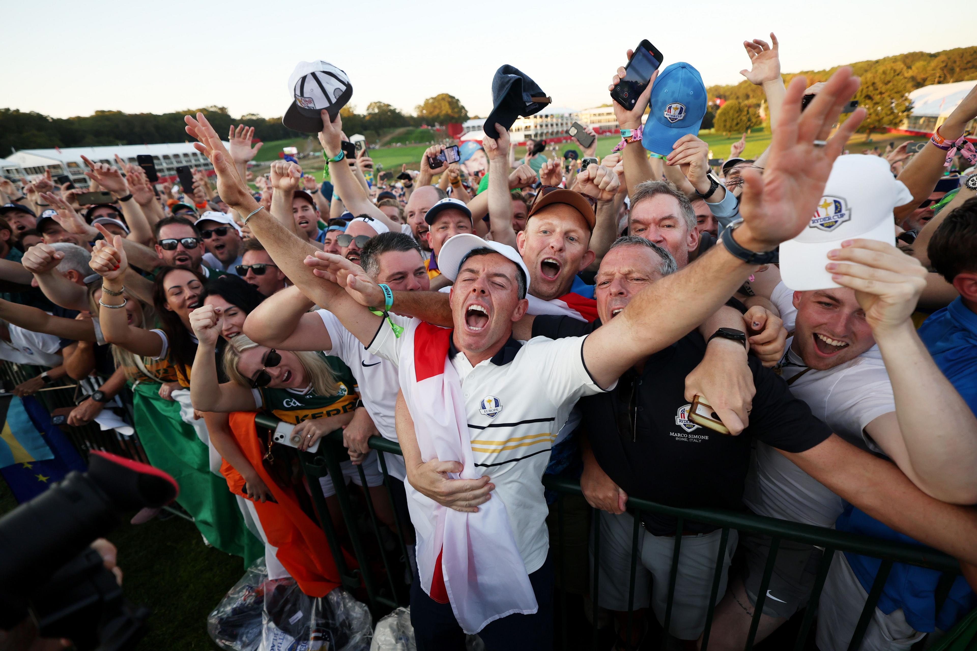 Rory McIlroy celebrates with fans after Europe's 15-13 win over the USA in the Ryder Cup in New York