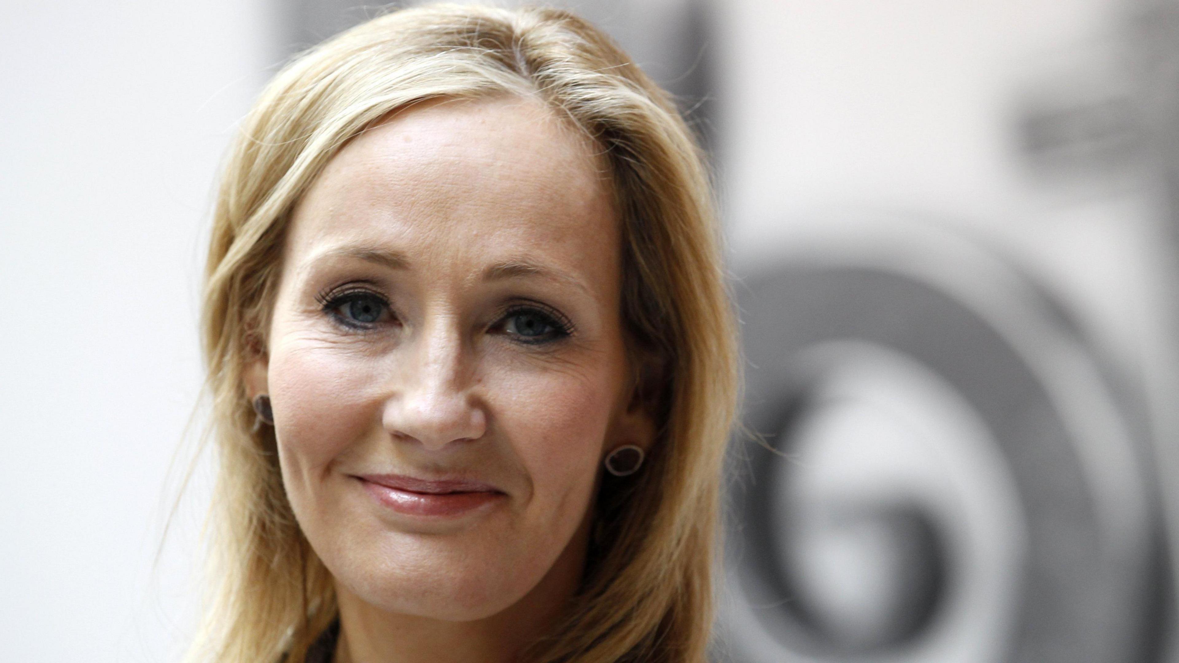 JK Rowling smiling into the camera