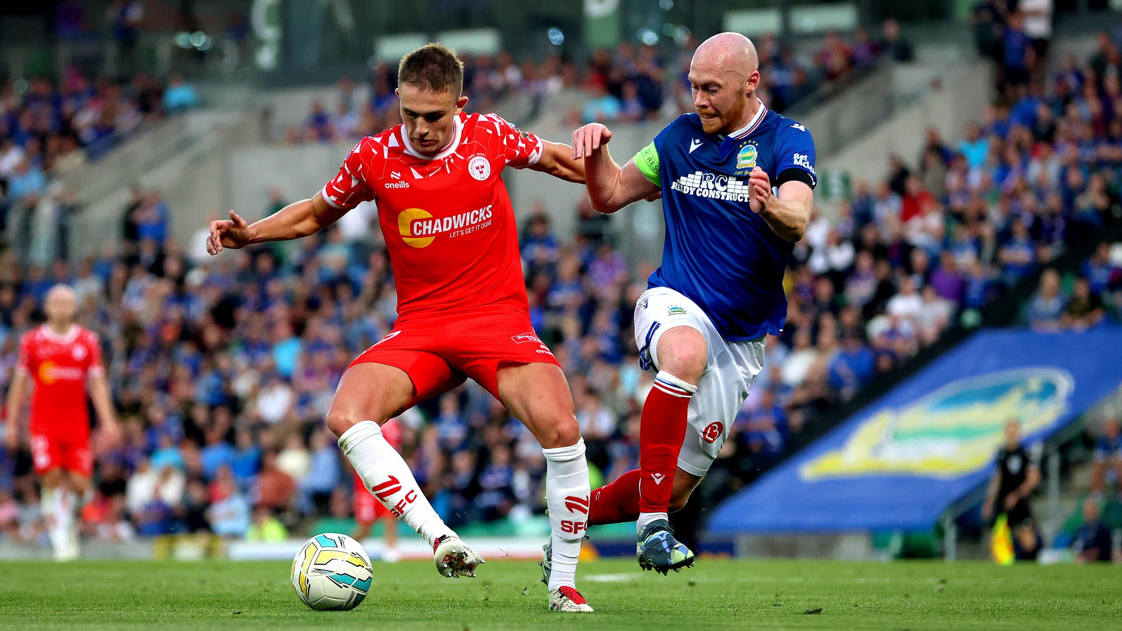 Chris Shields tackles Evan Caffrey 