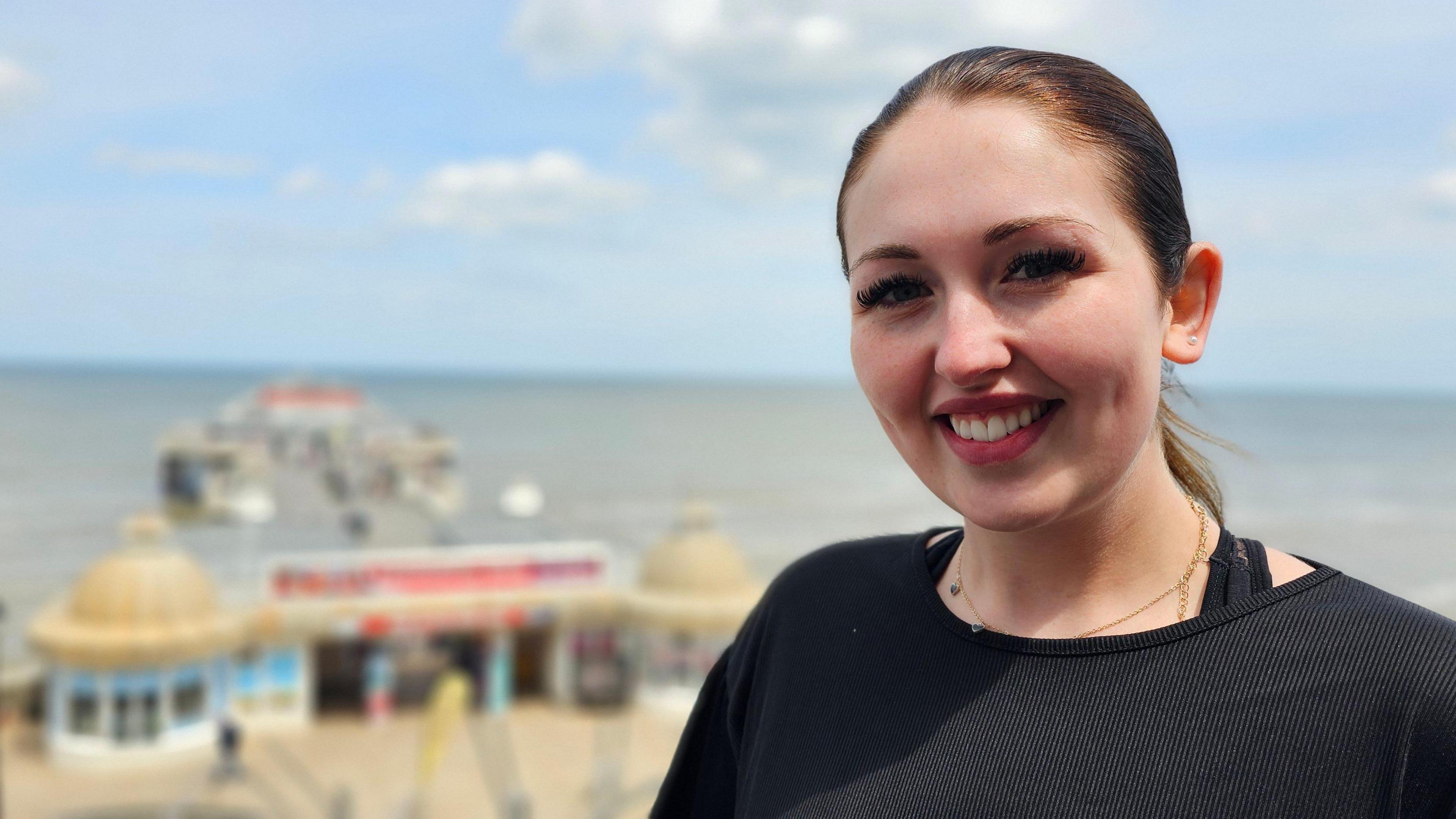 Charlotte Spendlove, with Cromer Pier in the background