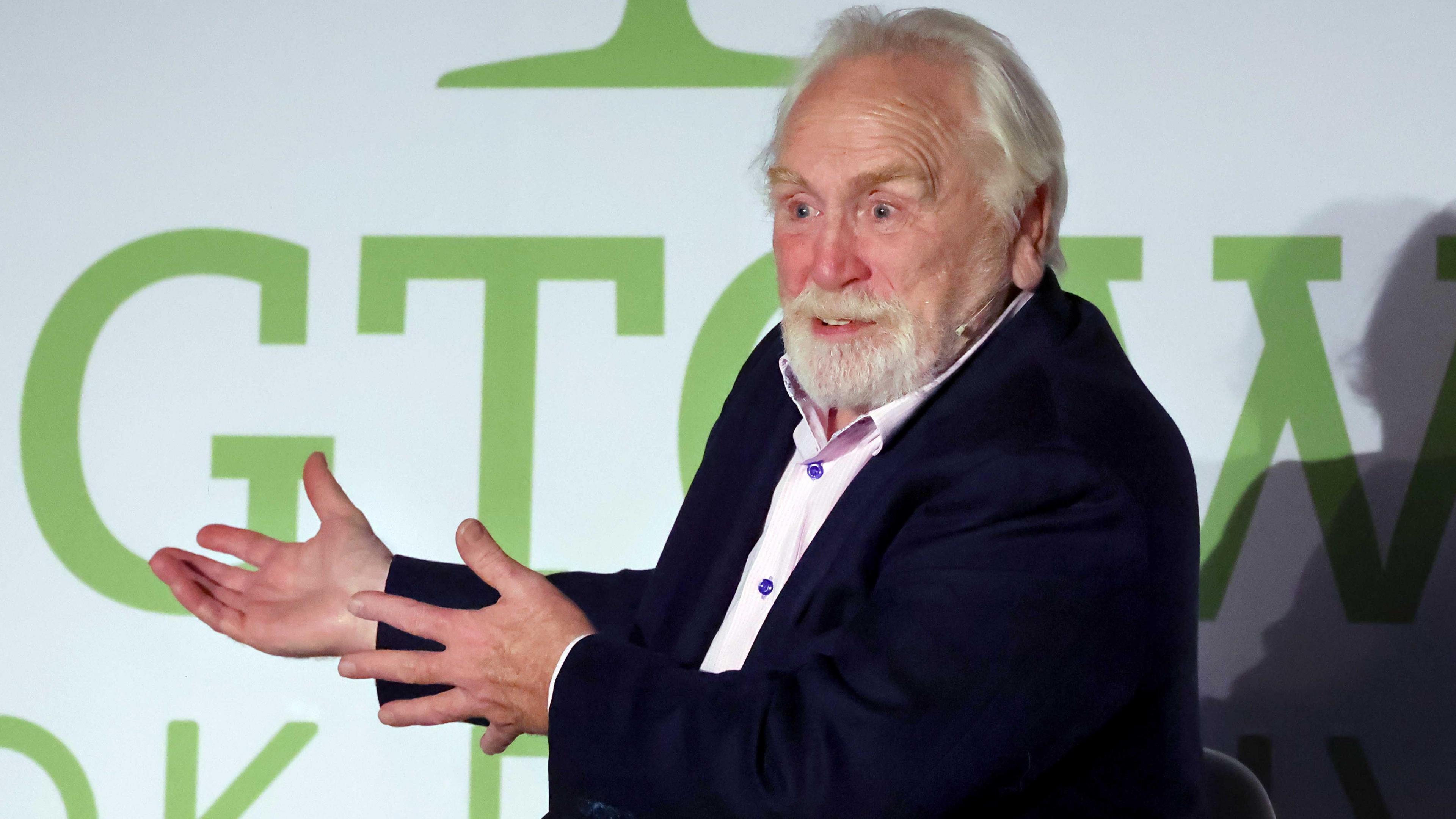 James Cosmo in animated pose during his talk at this year's Wigtown Book Festival