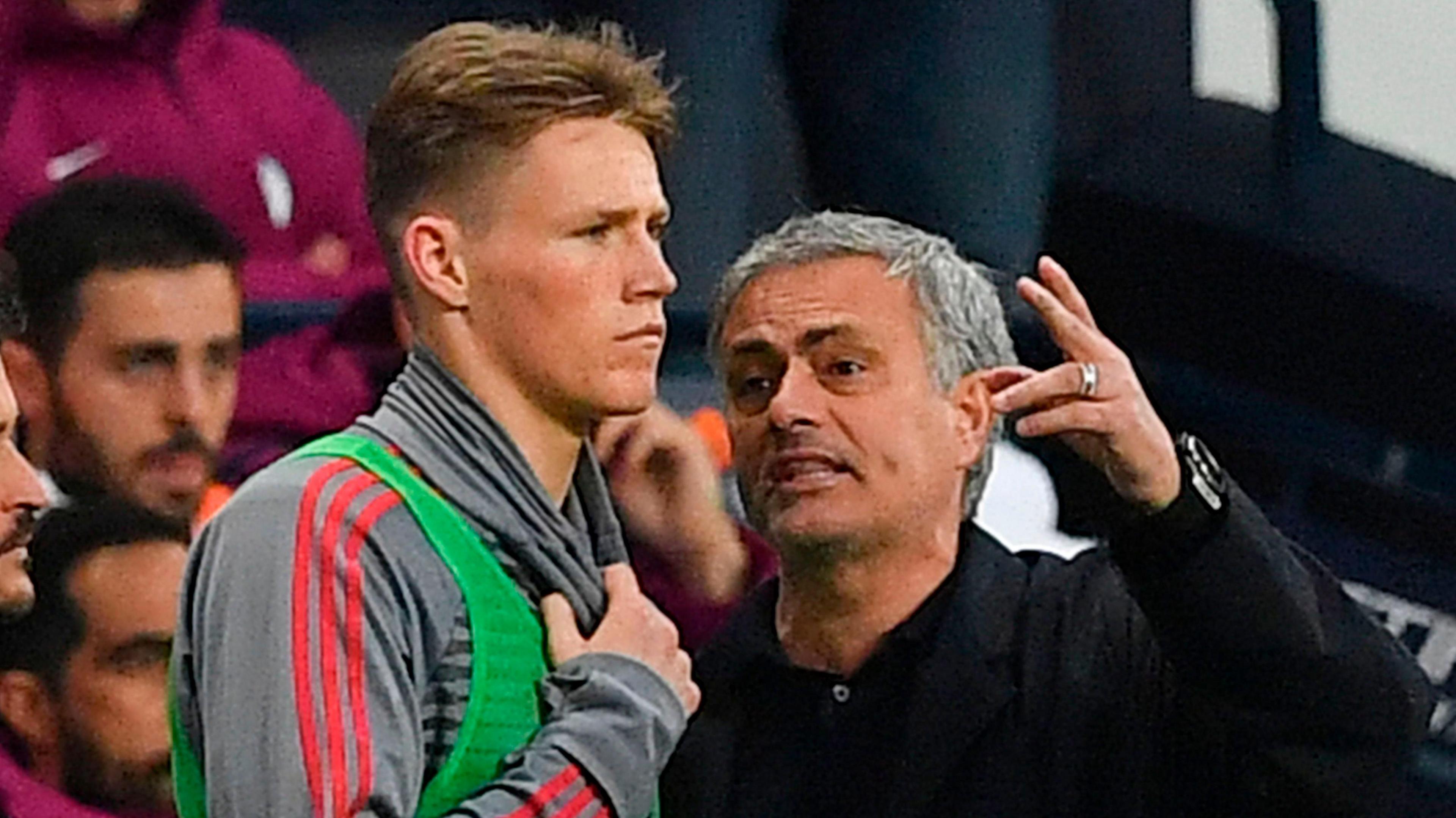 Scott McTominay chats with Jose Mourinho