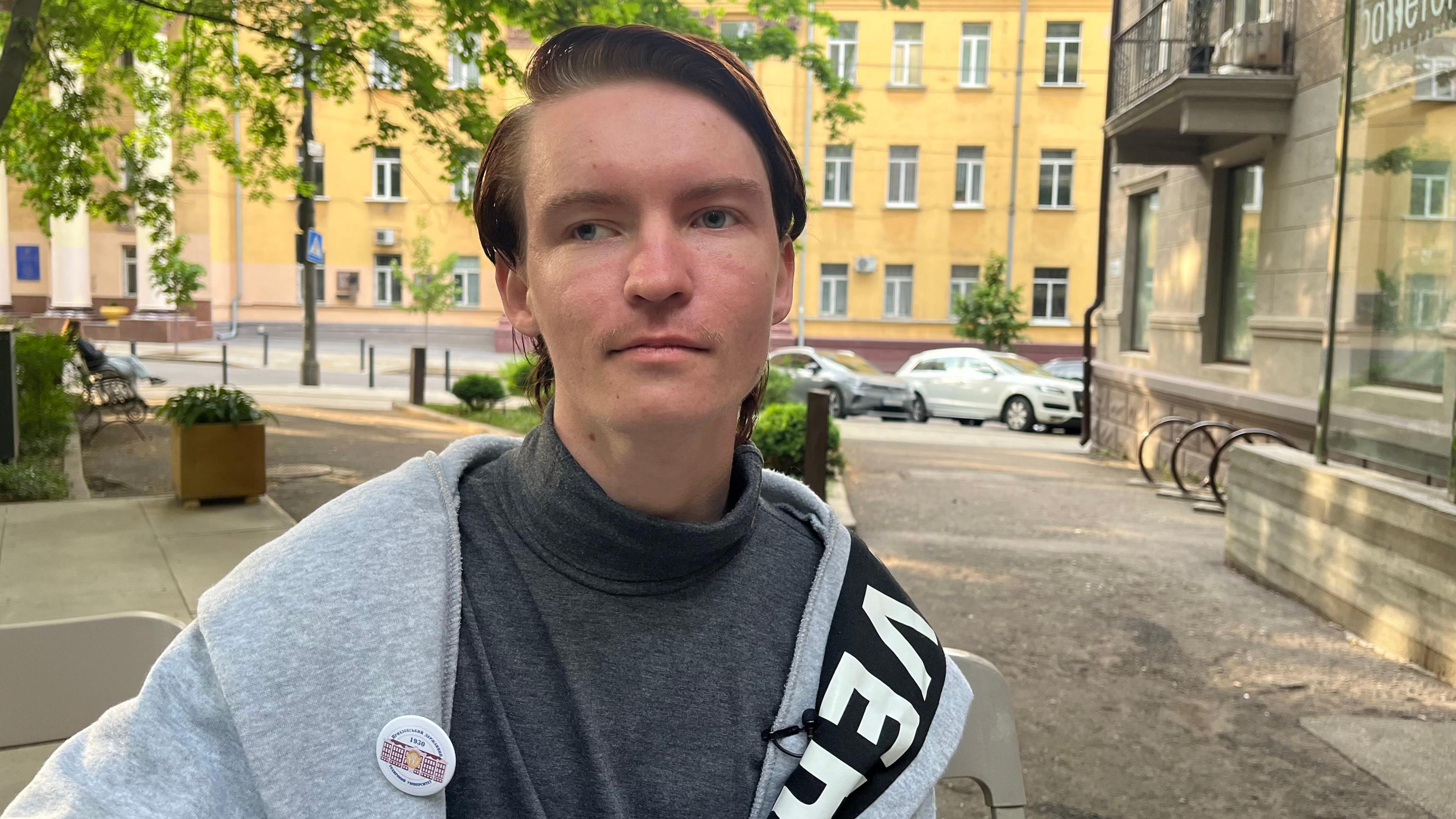 Andrii Kozhushyna faces the camera