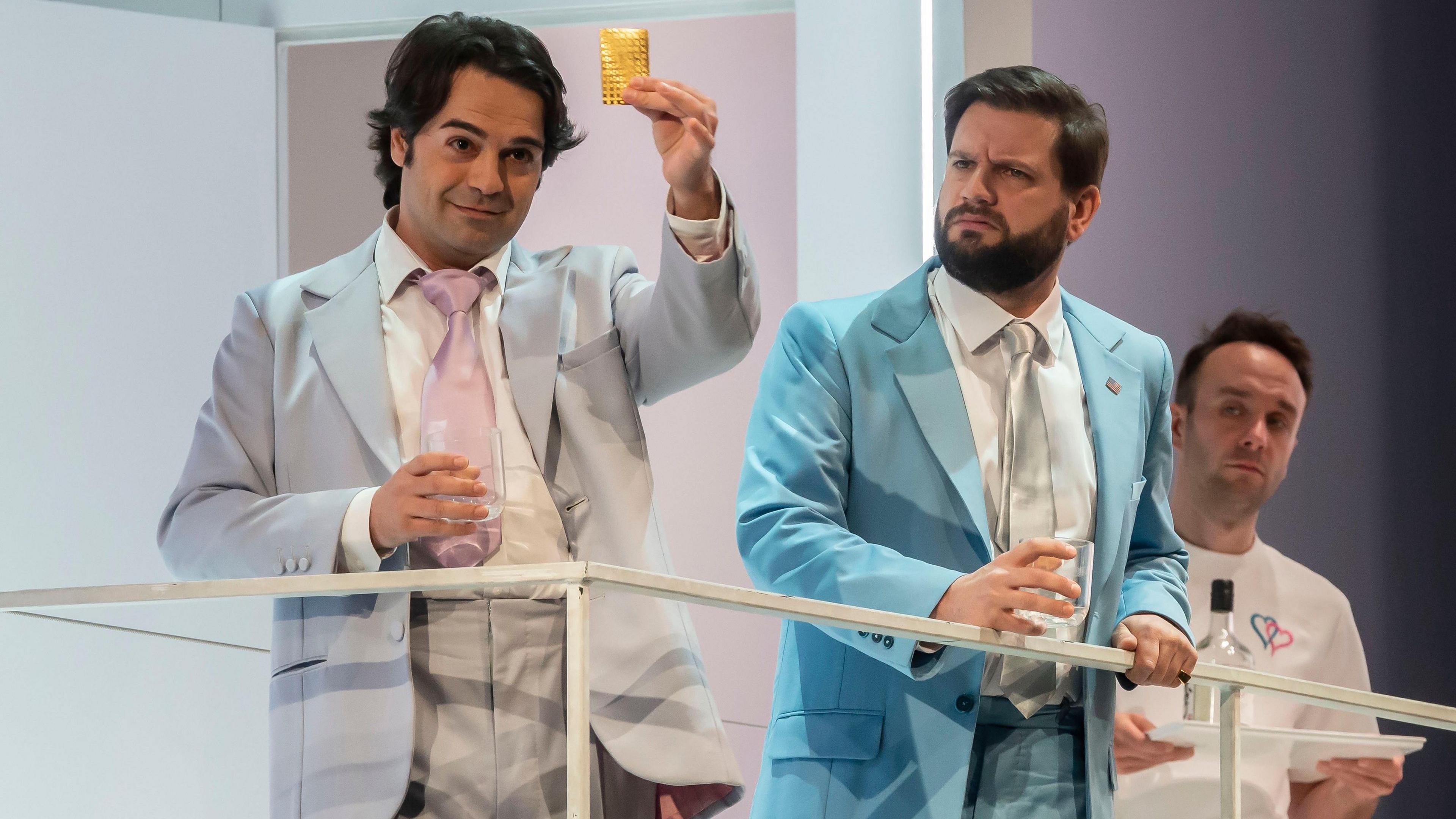 Leonardo Caimi as Pinkerton and Gareth Brynmore John as Sharless perform on stage during a rehearsal of Madama Butterfly at the Wales Millennium Centre in March 2022.