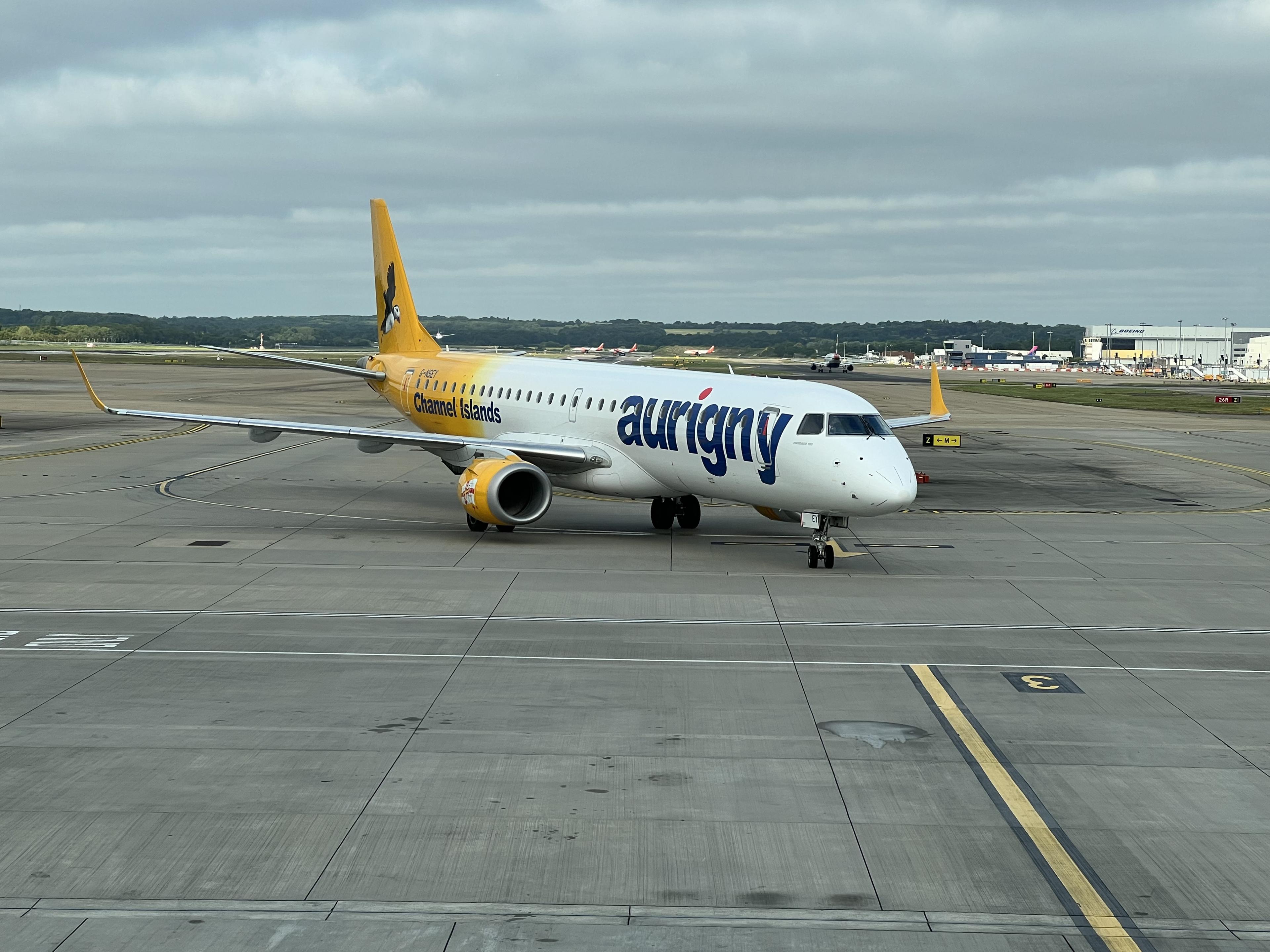 Aurigny plane taxiing at airport