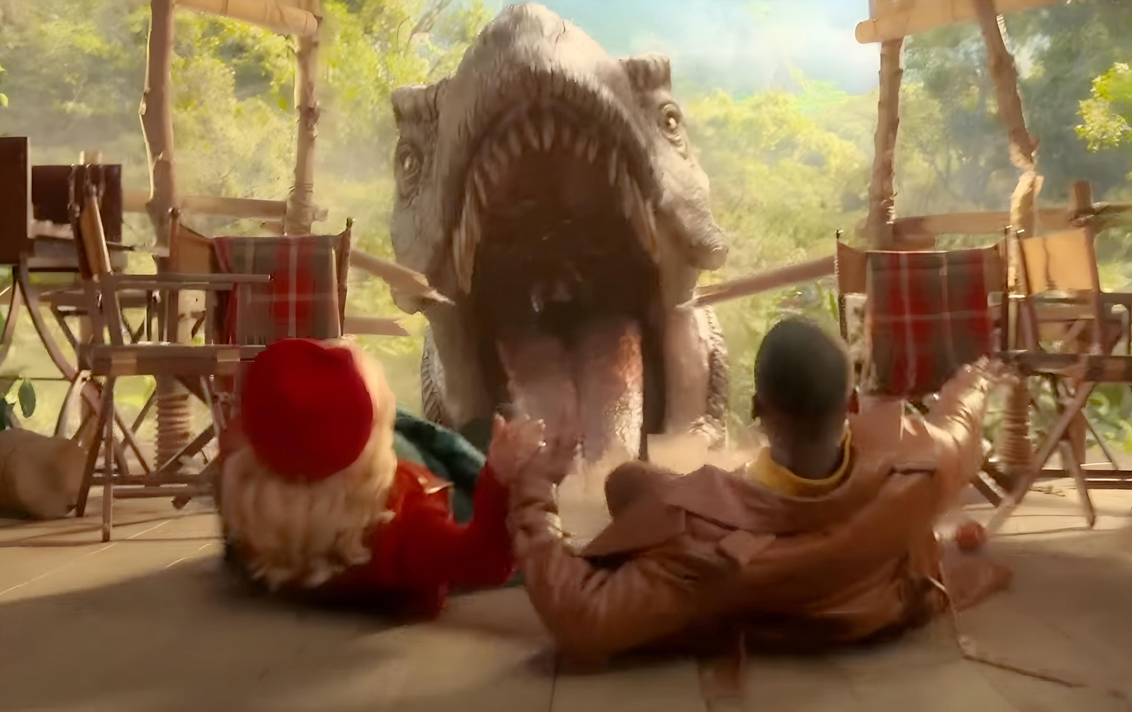 The Doctor and Joy fall towards a T.rex's open jaws. 