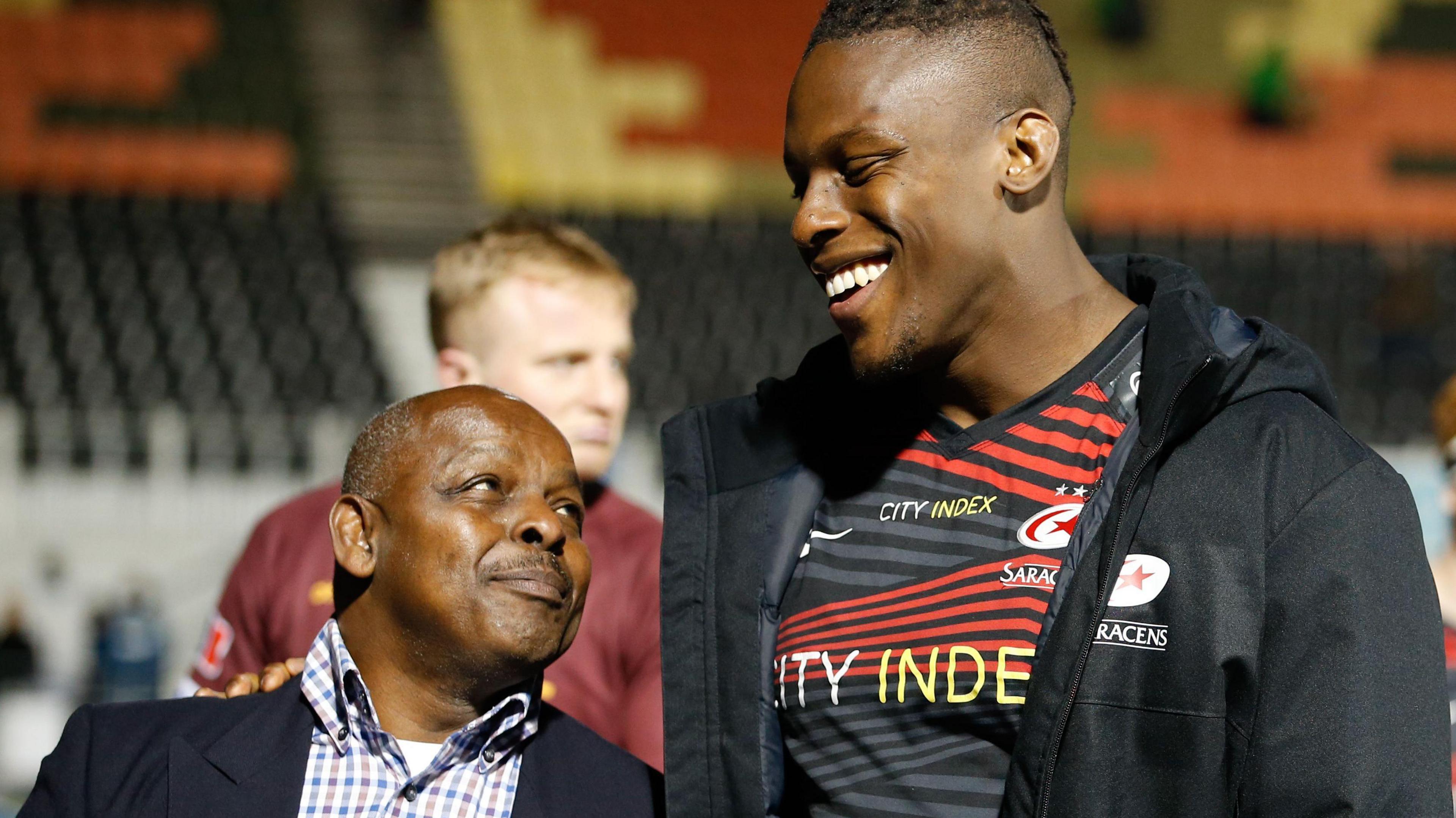 Floyd Steadman looking up at Maro Itoje