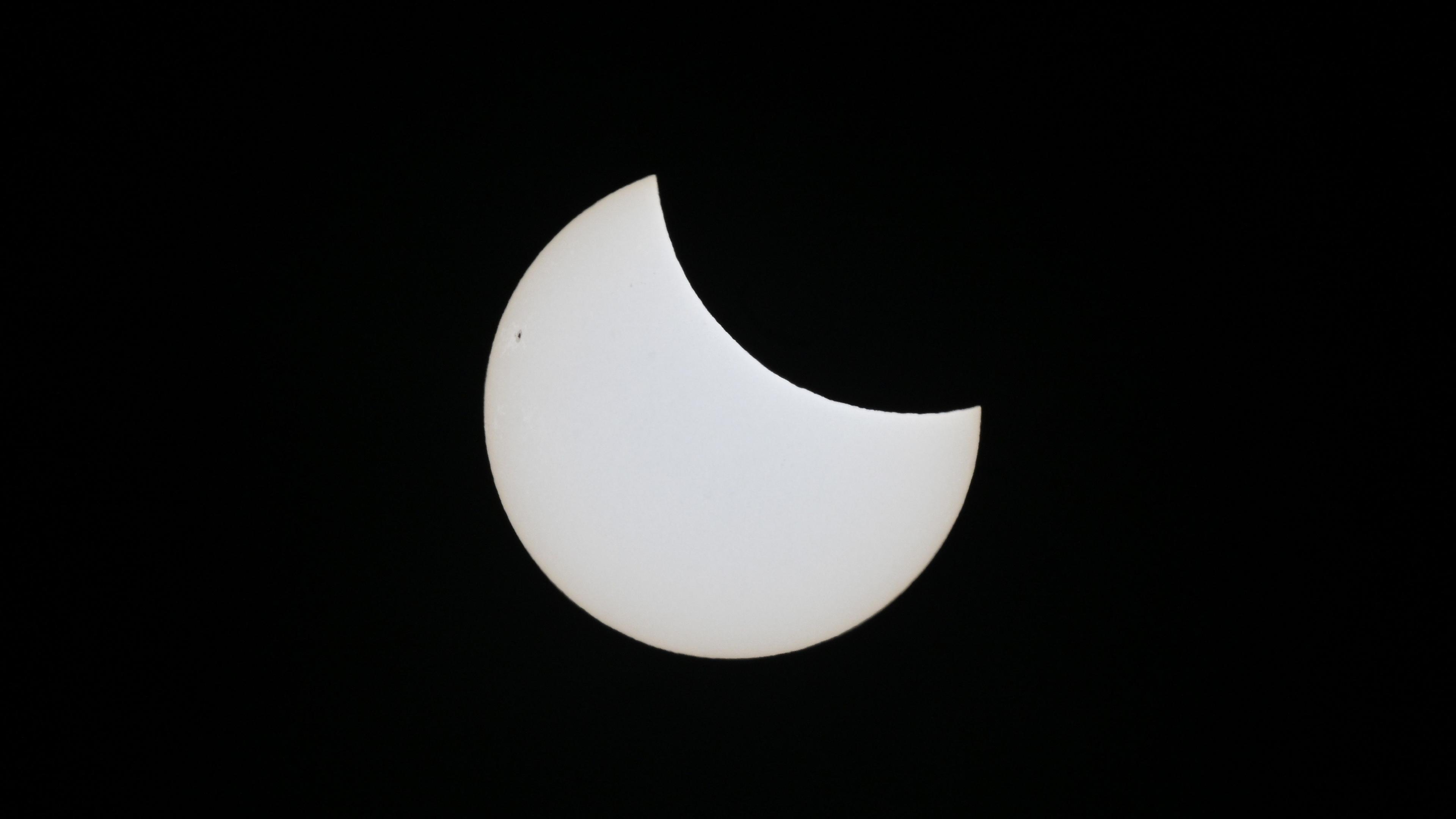 the peak of a partial solar eclipse, seen from Eastbourne, East Sussex, United Kingdom, 29 March 2025