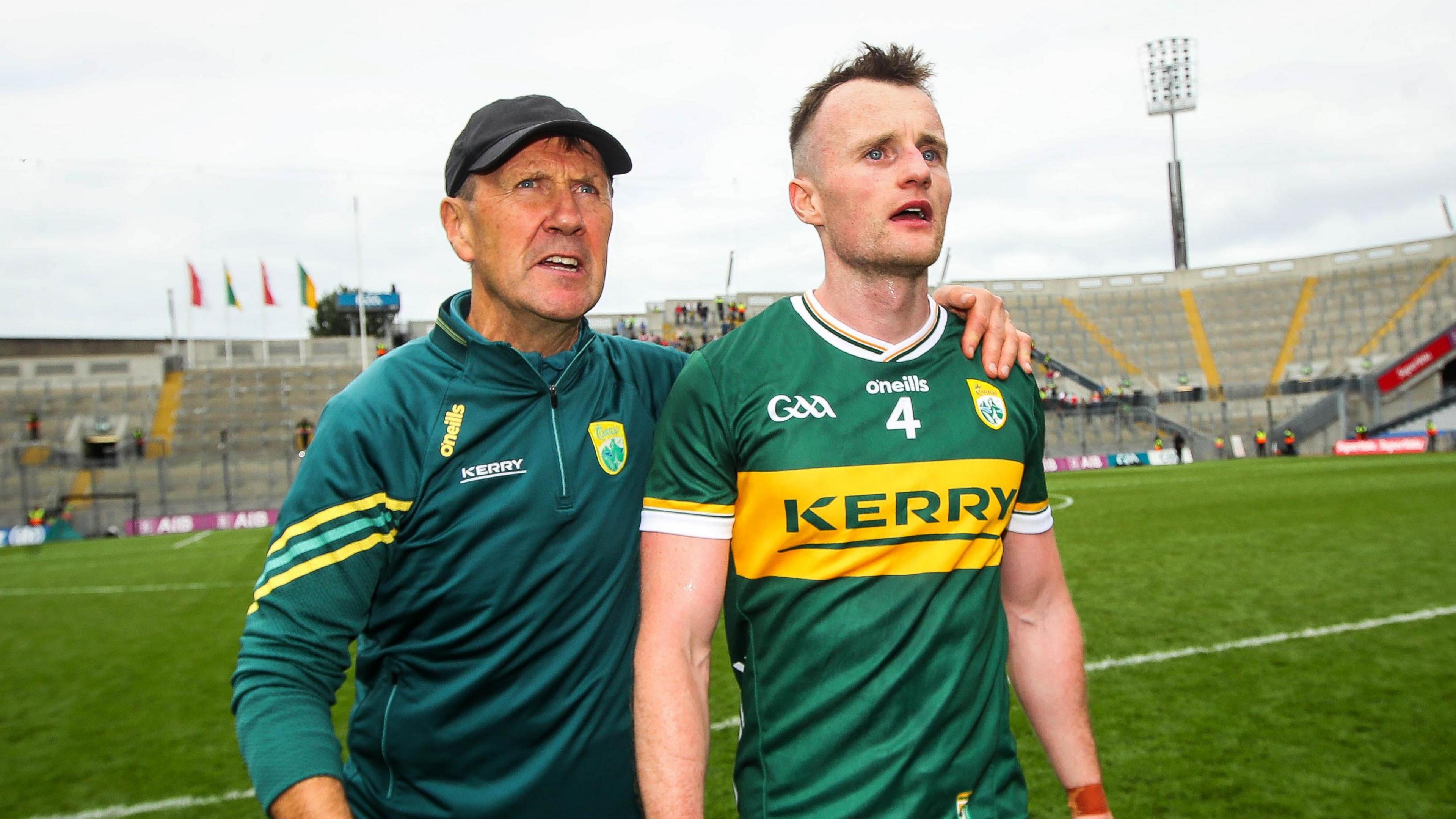 Jack O'Connor and Tom O'Sullivan go to the Kerry fans in Croke Park after their five-point win over Derry