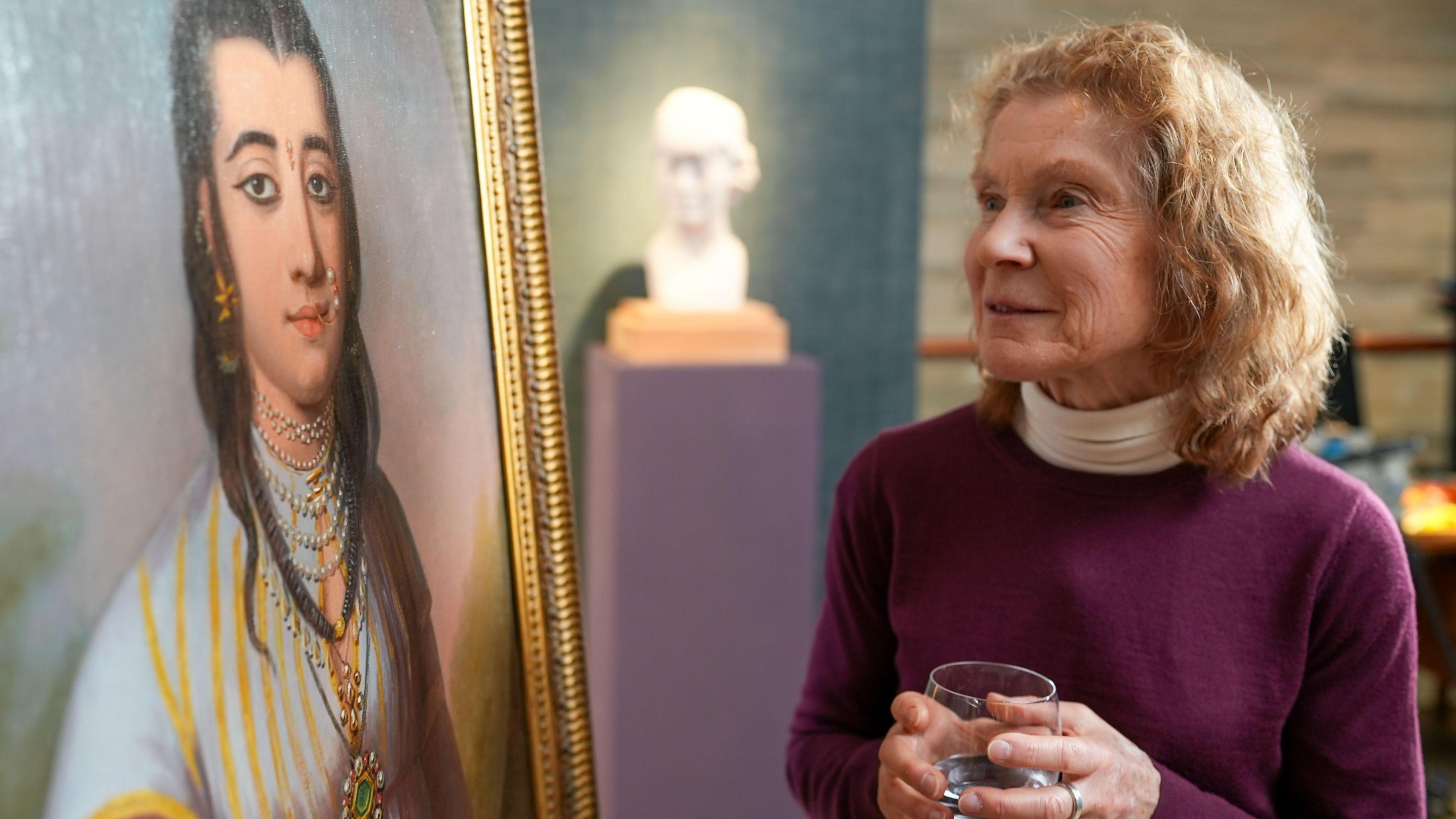 Mary-Louise Wedderburn with her painting, thought to be by a famous relative, 18th Century Scottish artist, Katherine Read.