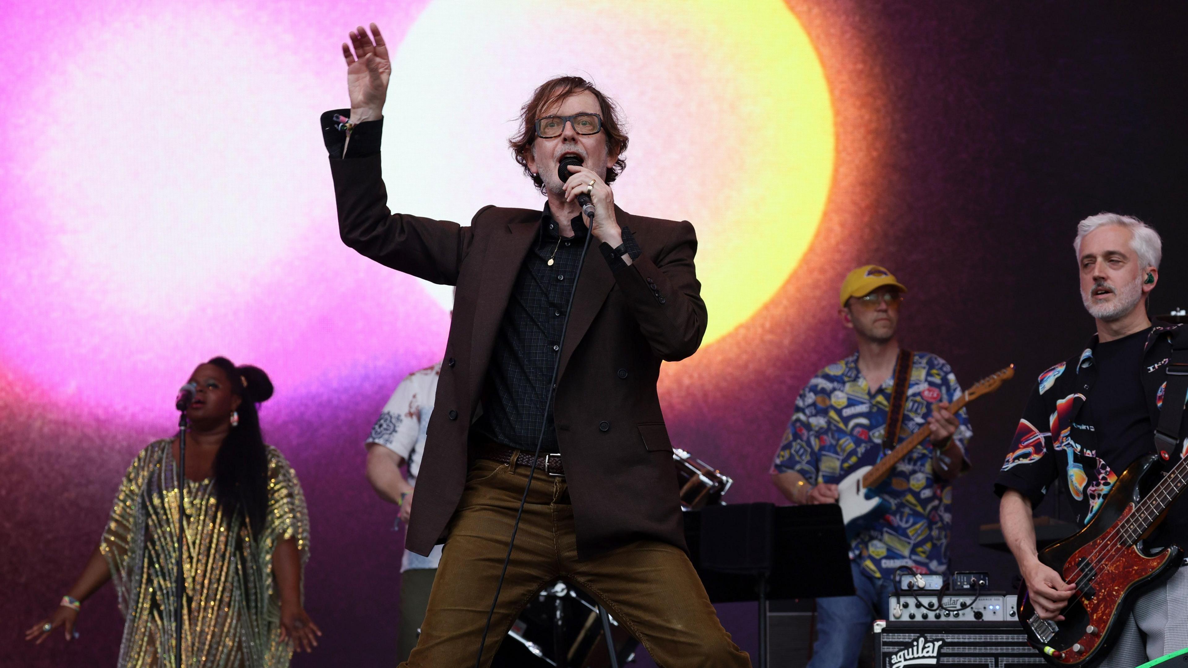 Jarvis Cocker from Pulp singing on stage