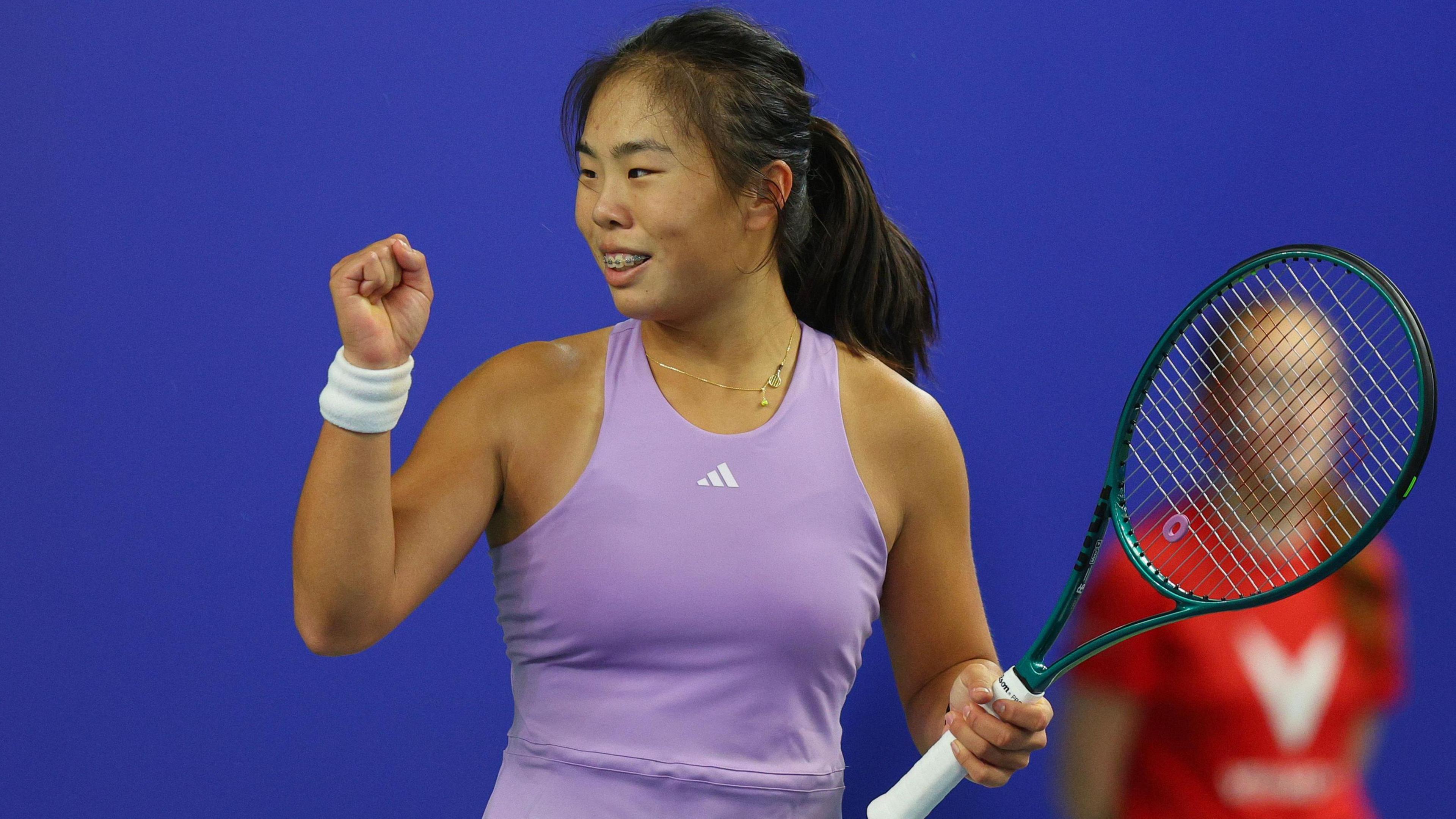 Mimi Xu celebrates her win