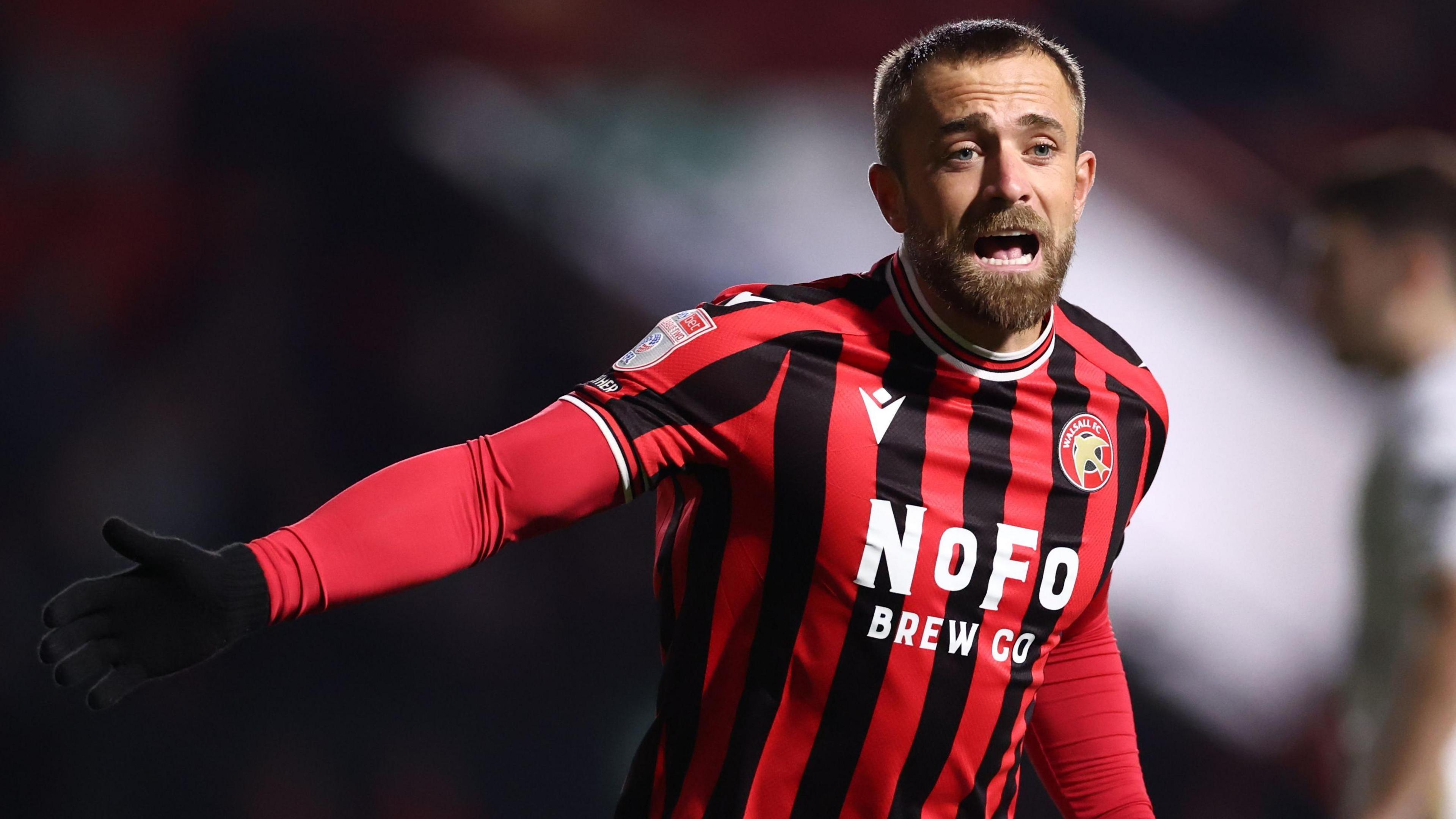 Walsall's Alex Pattison in action