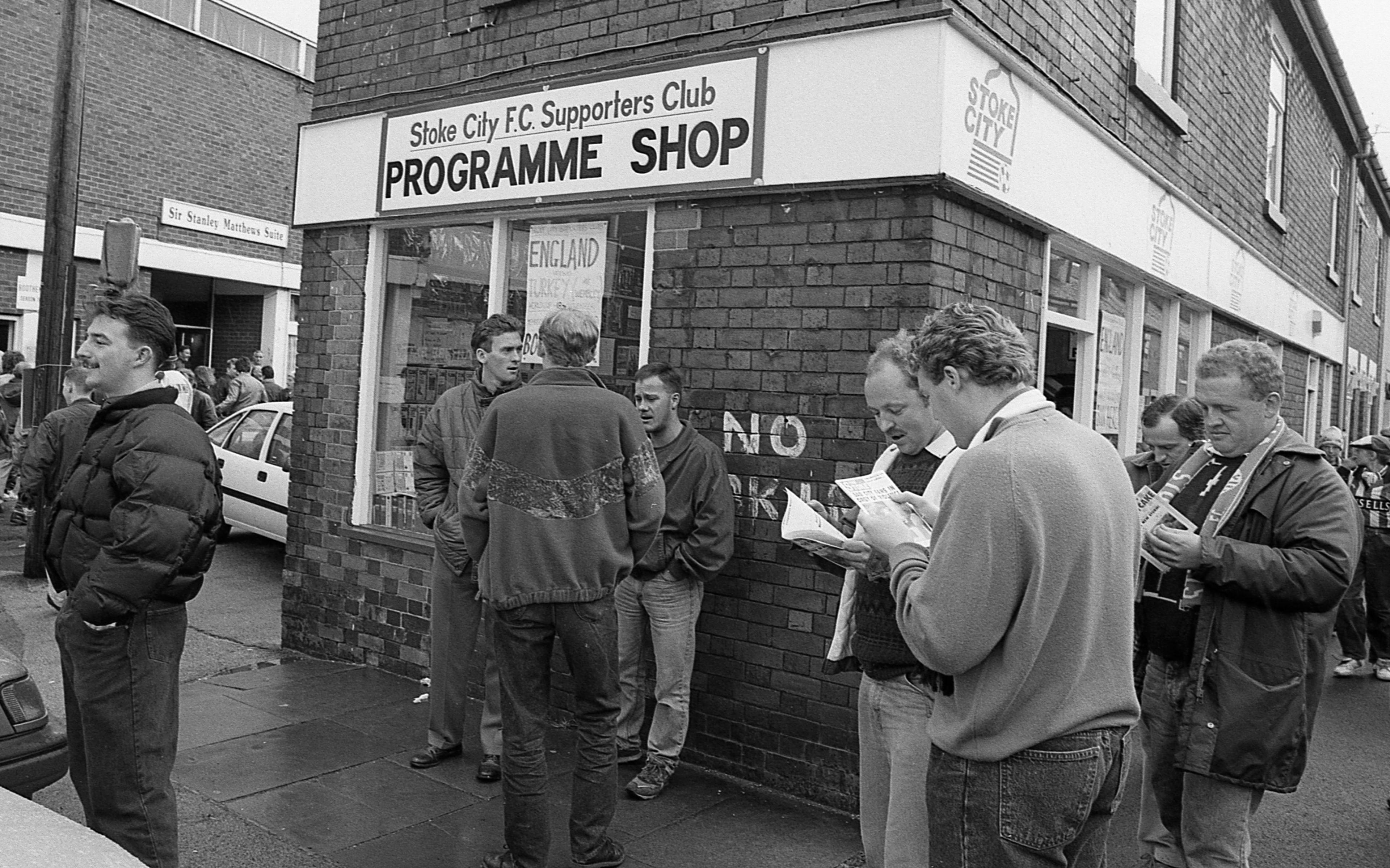 Fans outside the programme shop