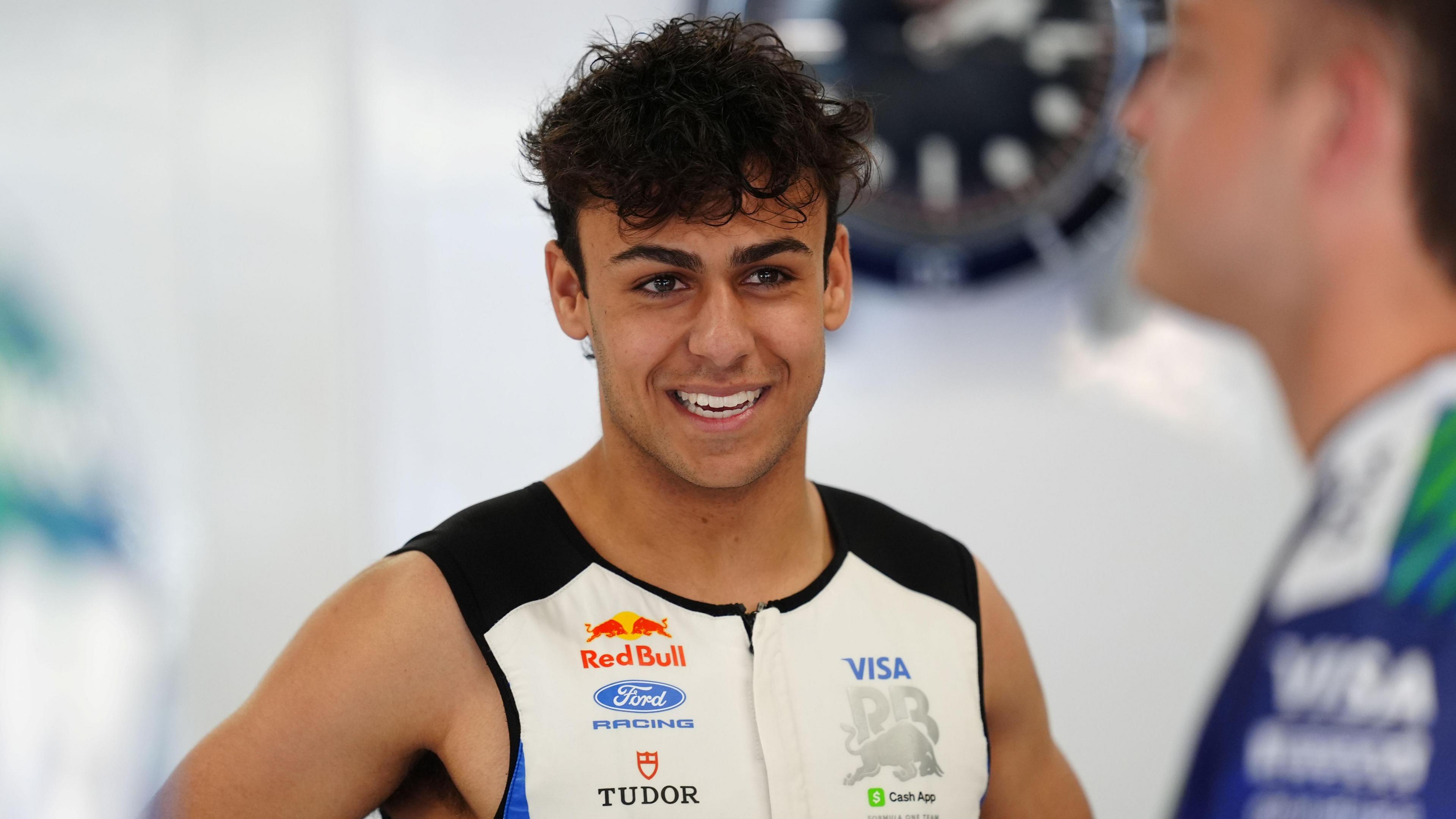 Arvid Lindblad wearing a sleveless Racing Bulls top at the Barcelona-Catalunya Grand Prix