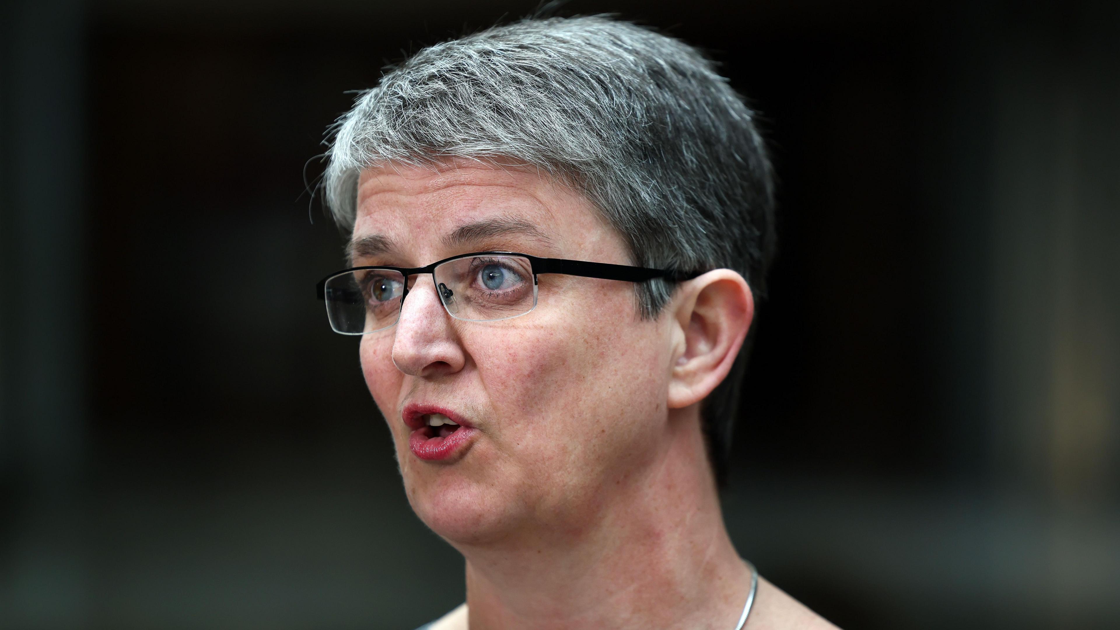 Maggie Chapman - a woman with short greying hair and lasses -speaking