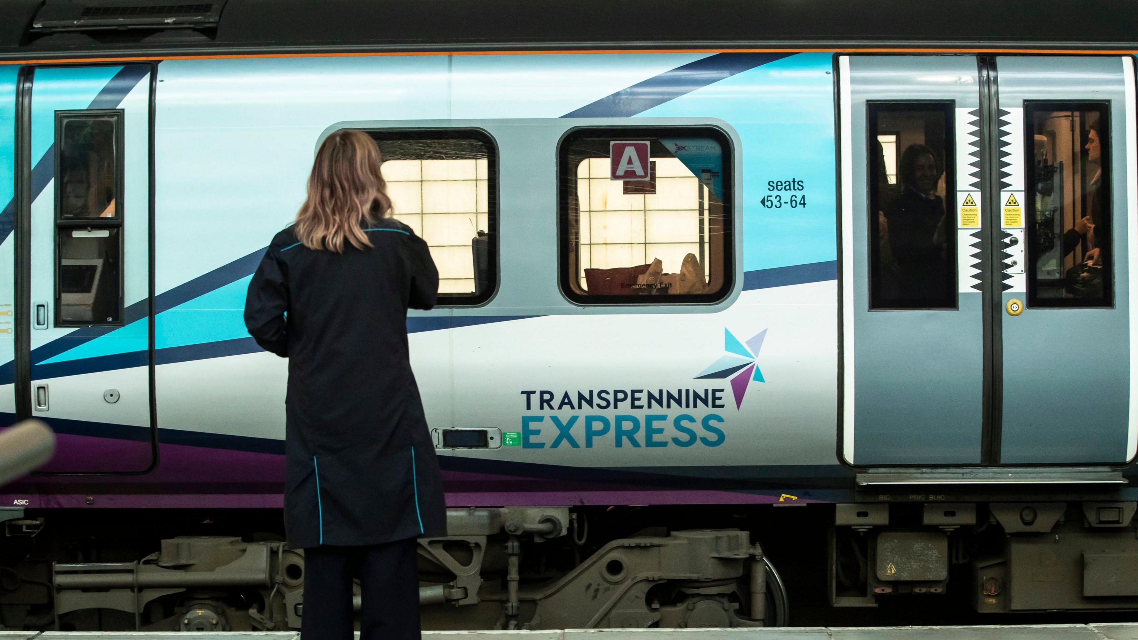 A TransPennine Express train arrives at Leeds Station