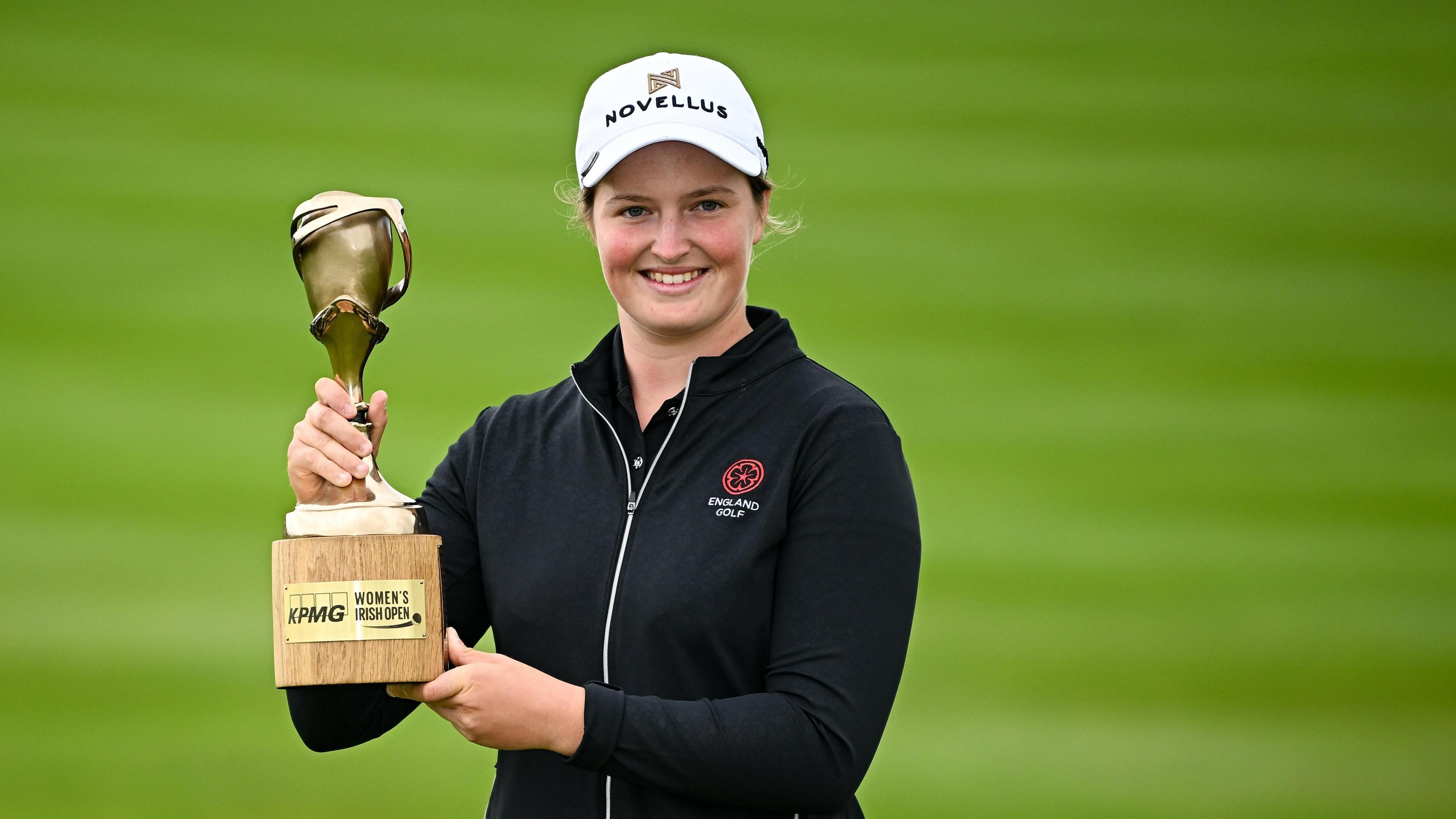 Lottie Woad poses with the Women's Irish Open trophy
