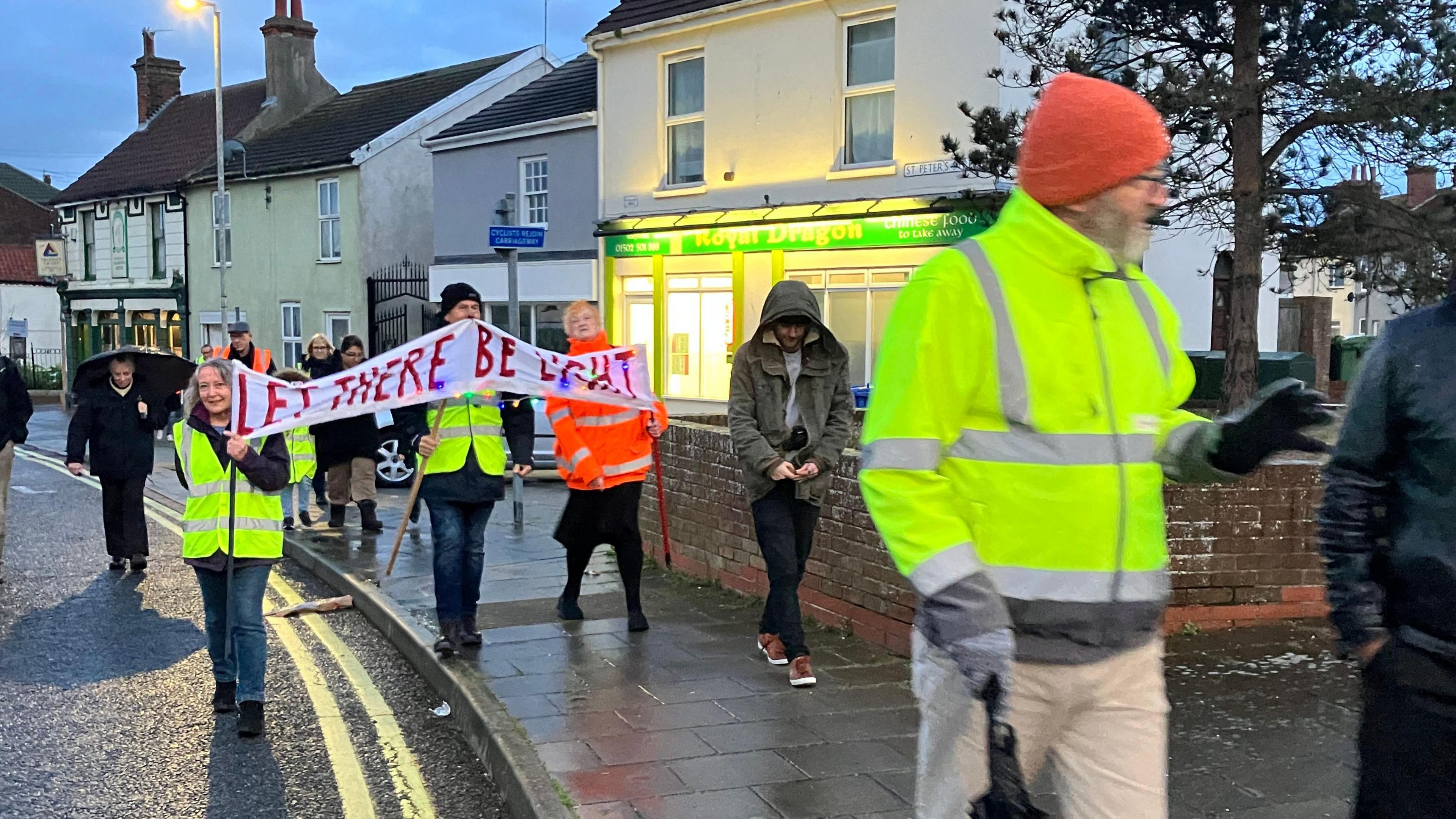 Lighten Our Darkness protesters marching in Lowestoft