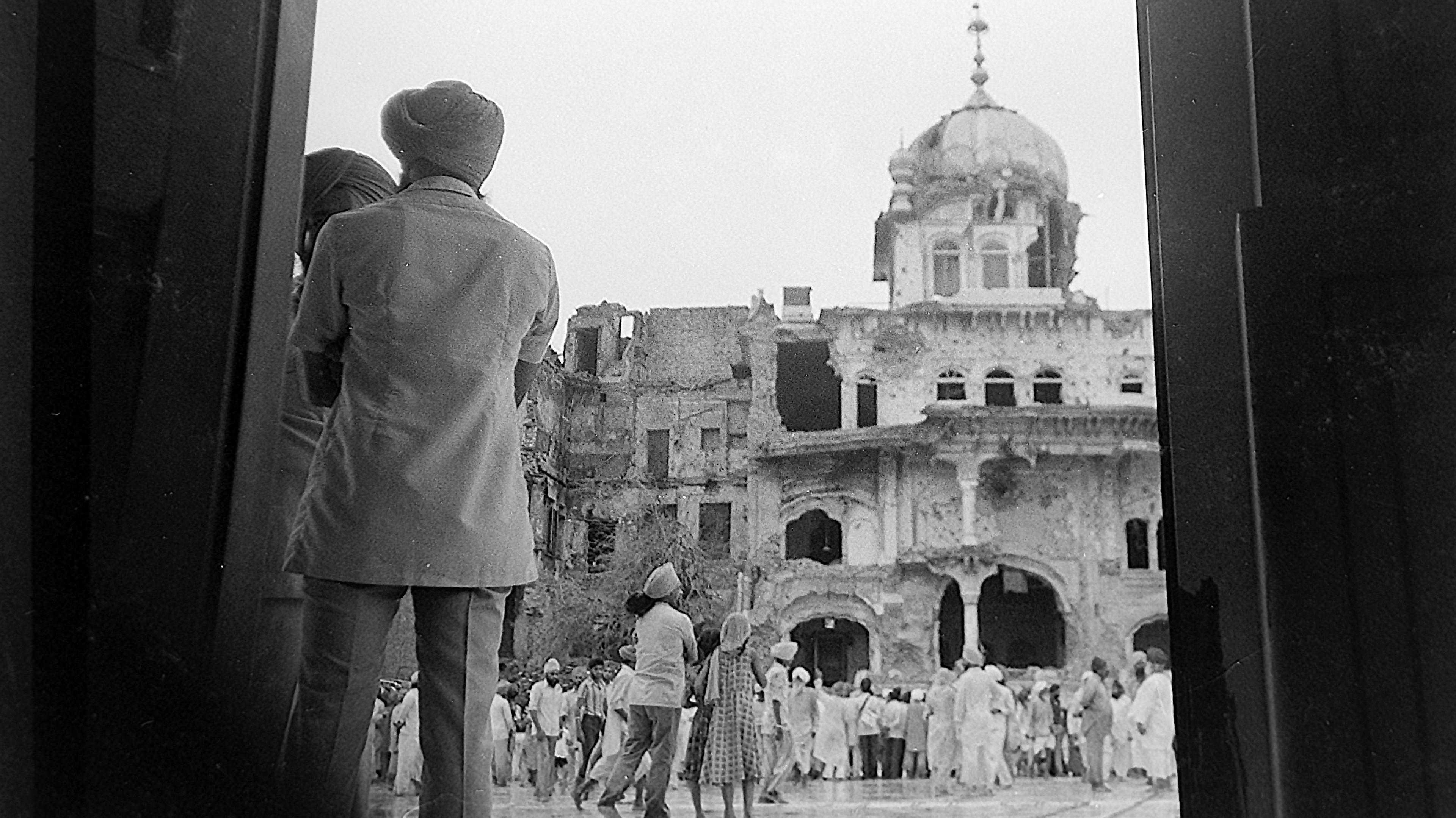 Akal Takhat, the sikh seat of temporal authority, damaged during the Indian army's Operation Blue Star in the Golden Temple Complex, Amritsar, Punjab, against Sikh separatists. This photo, shot on June 7, 1984, is the first image coming out of the damaged Golden Temple complex. (Photo by Sondeep Shankar/Getty Images)
