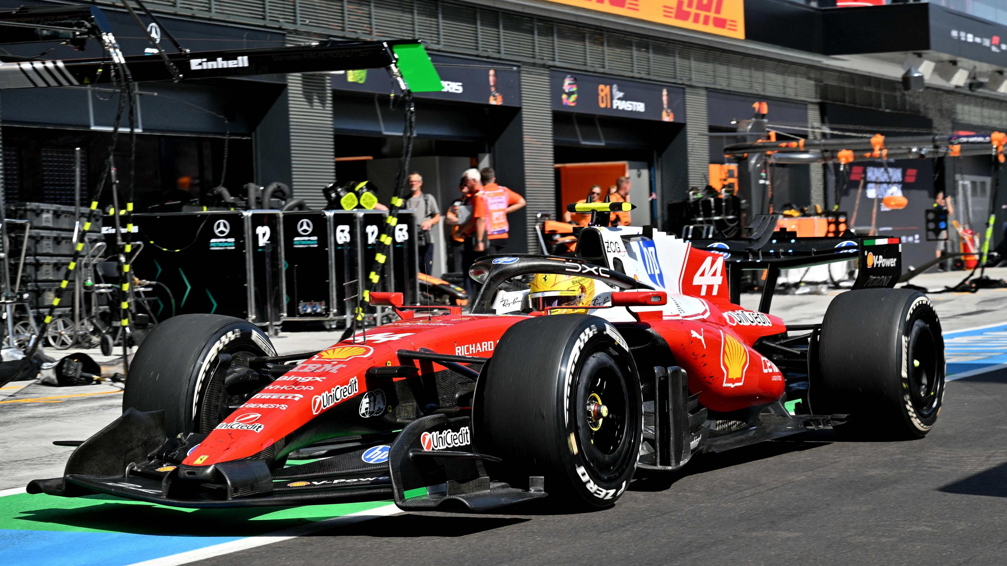 Ferrari's Lewis Hamilton driving down the pit lane during the Hungarian Grand Prix