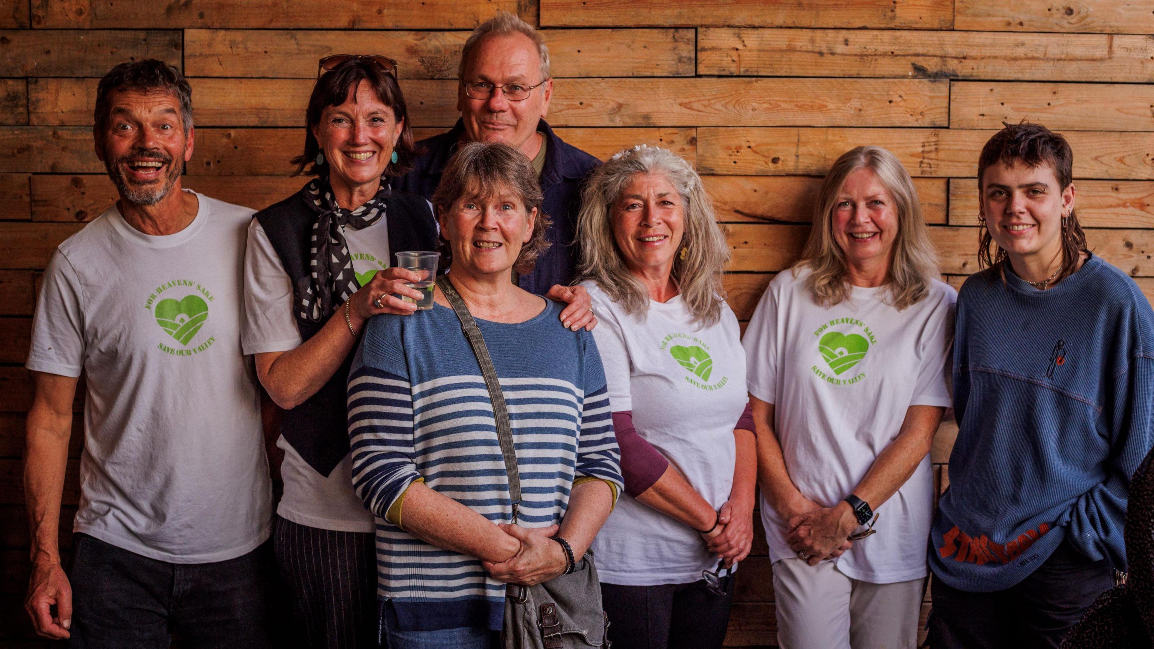 A group of people from the Heavens Valley Community Benefit Society smiling