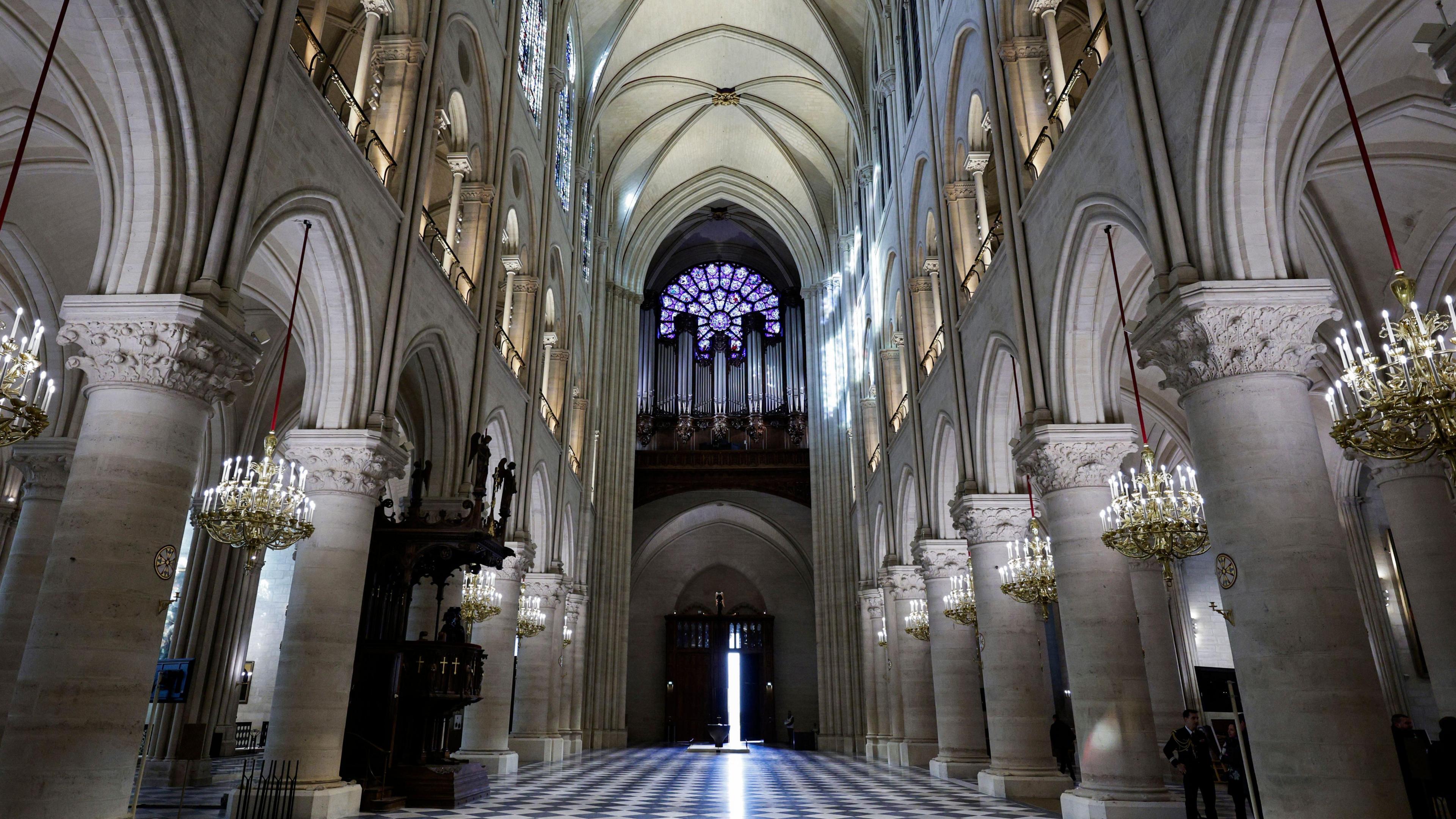 Image shows the organ in the nave, which sits under the western Rose window. 