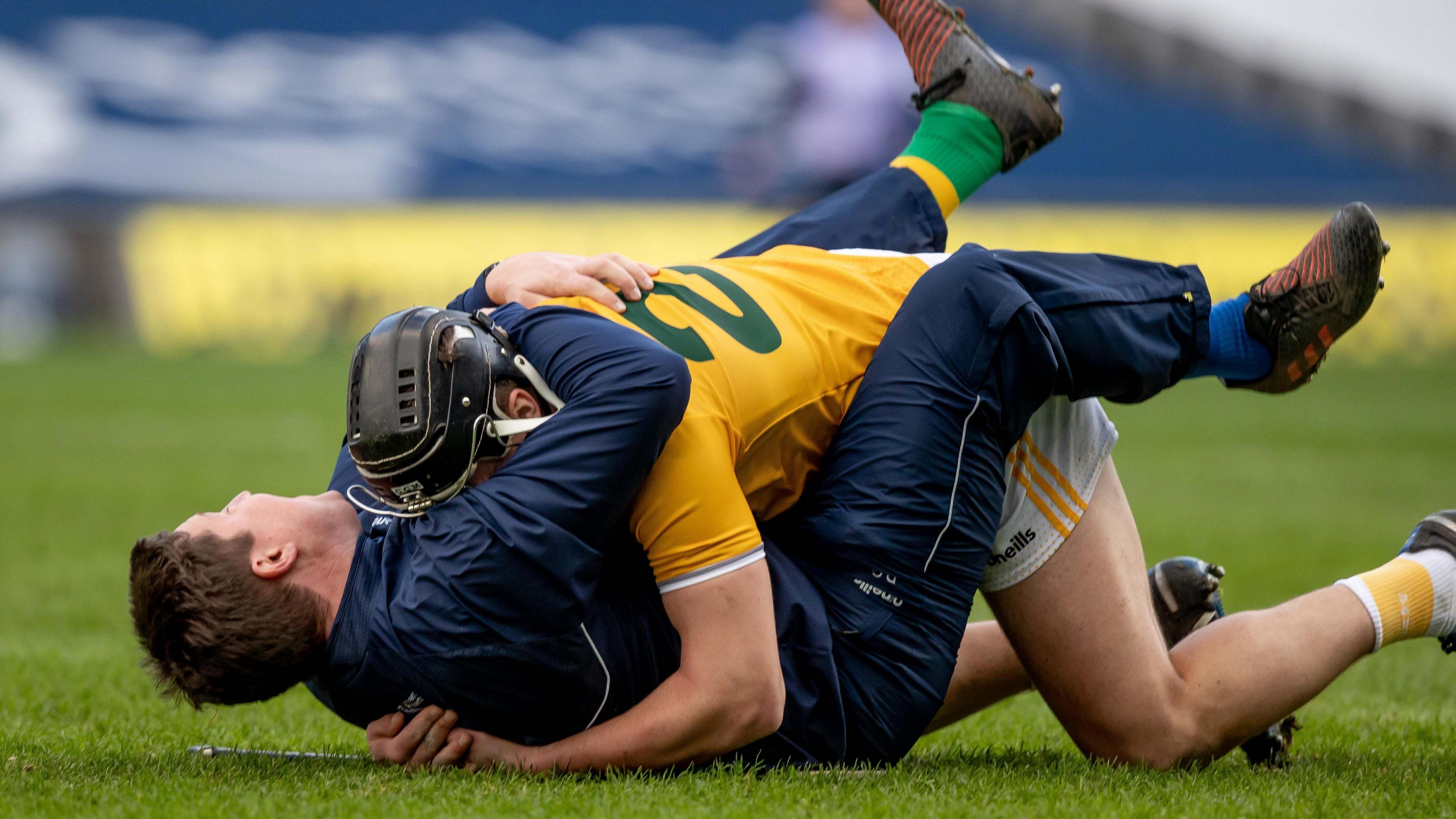 Gleeson celebrates with Domhnall Nugent after Antrim's Joe McDonagh Cup triumph in 2020