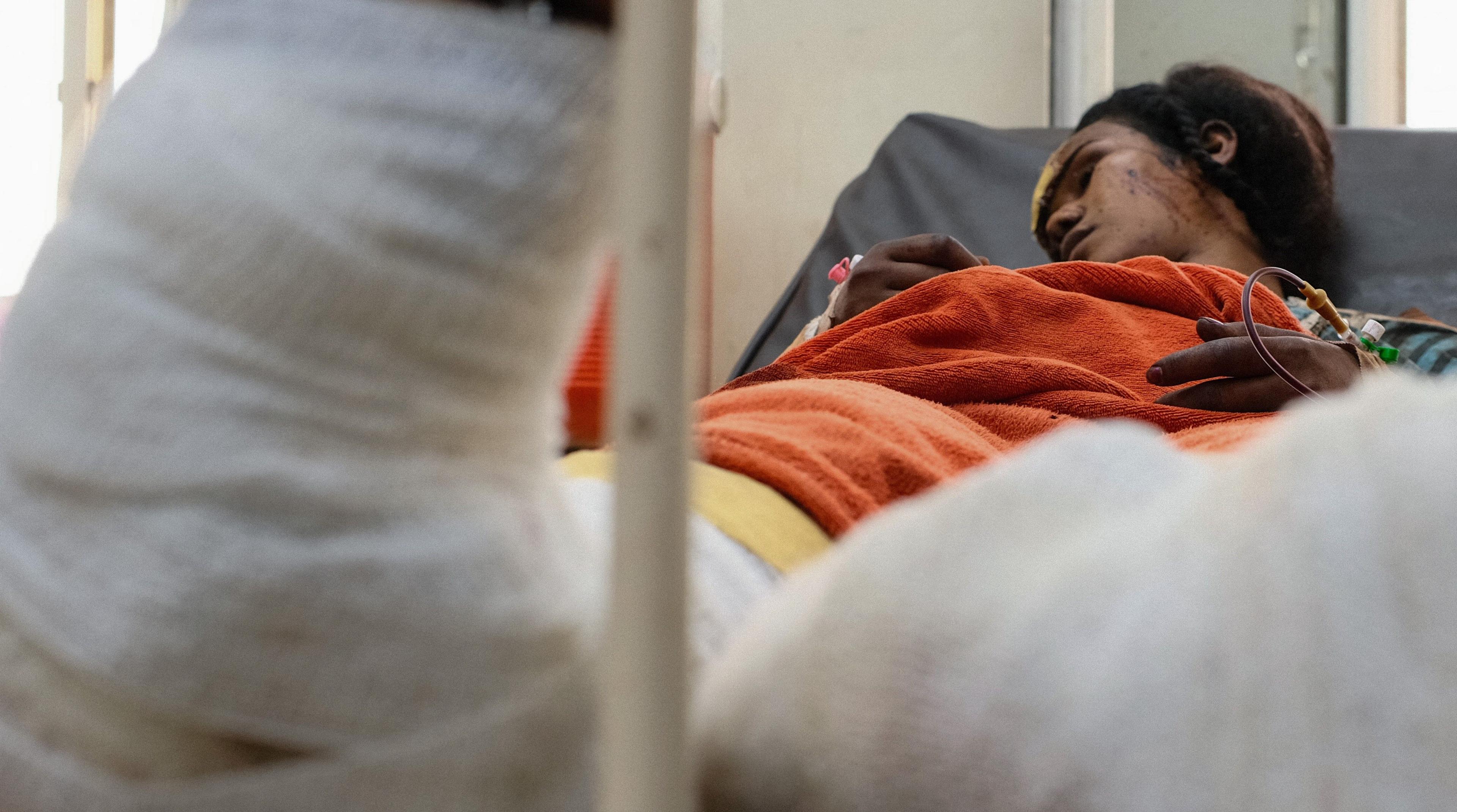Injured woman on a hospital bed