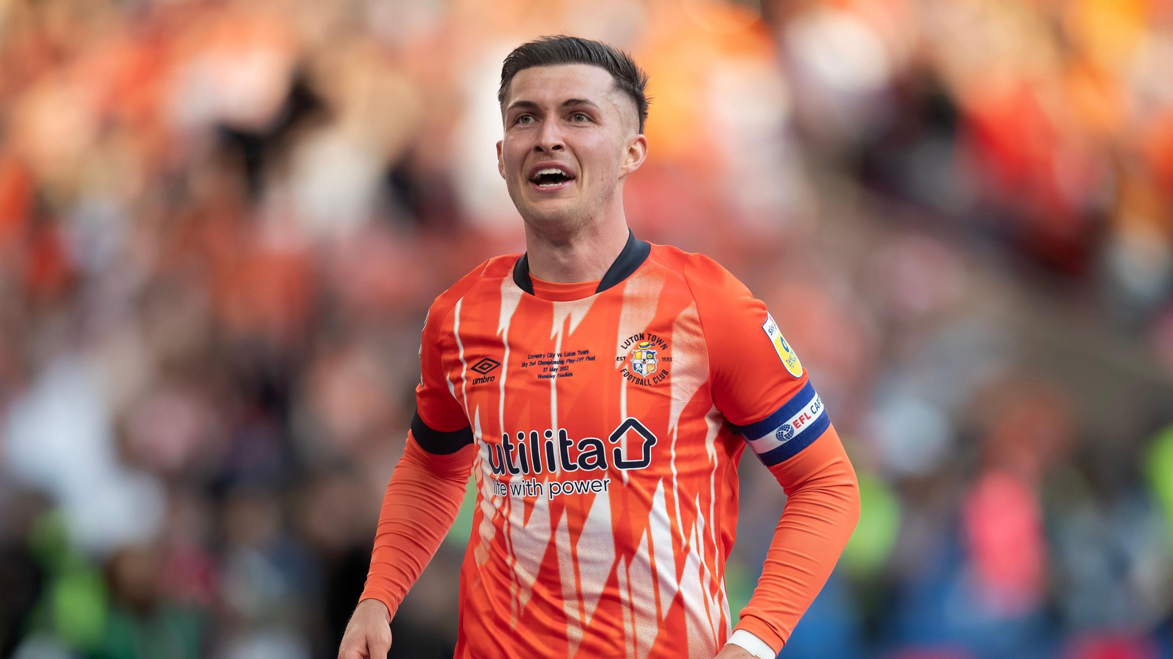 Dan Potts on the field for Luton during the Championship play-off final