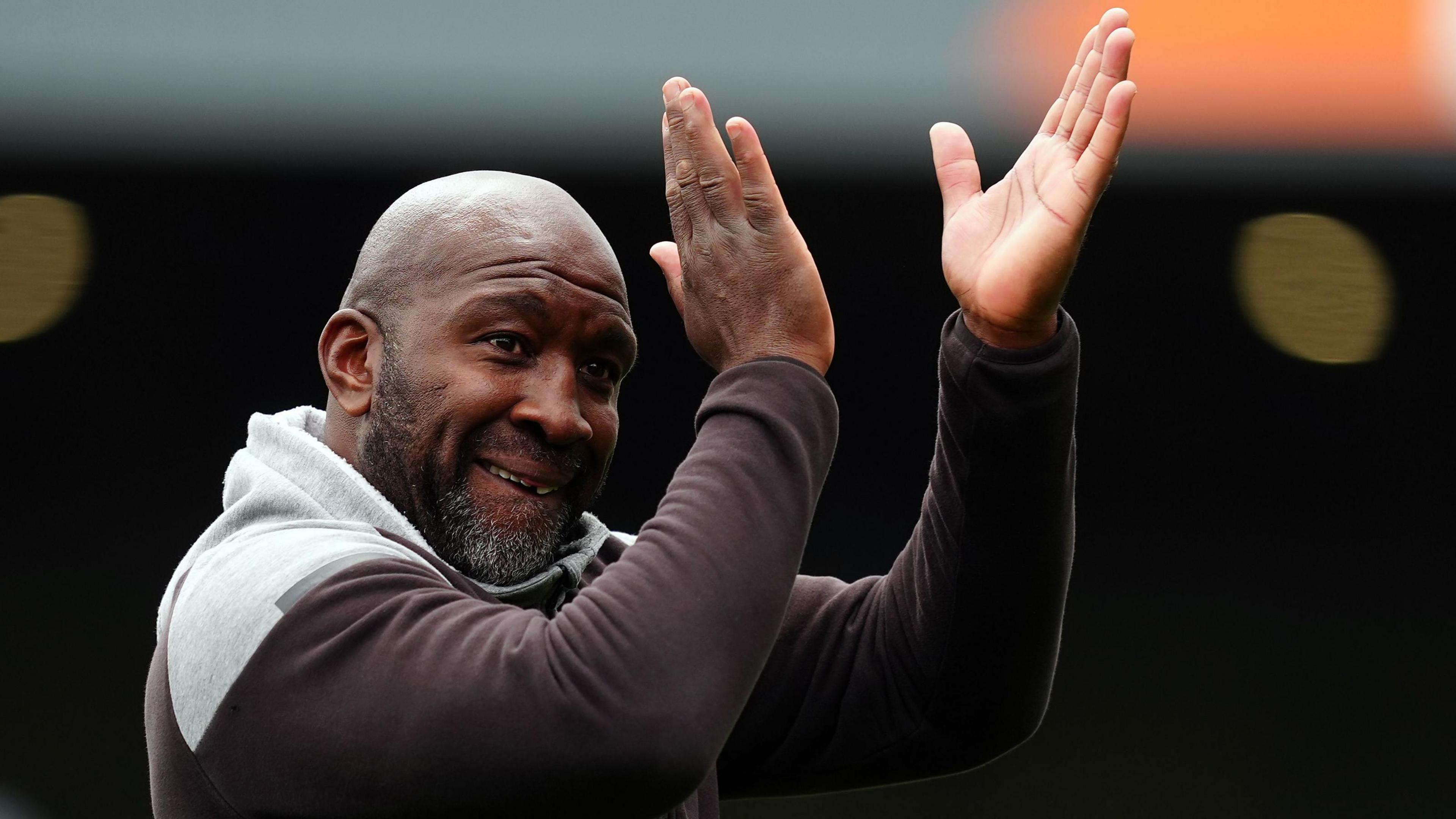 Darren Moore celebrating his latest side Port Vale's promotion to League One