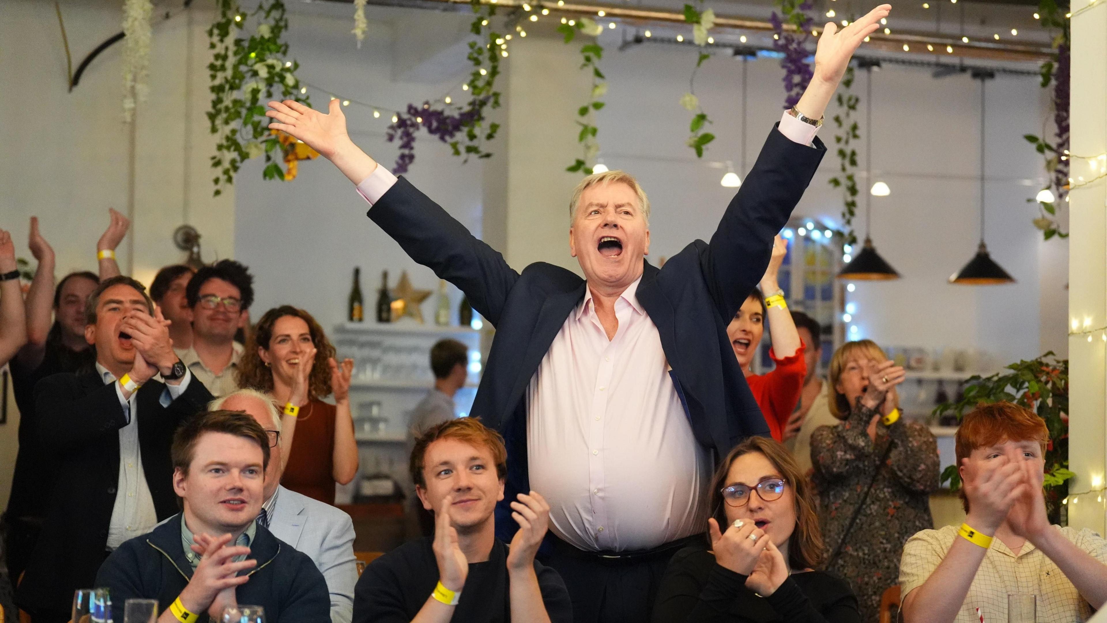 Supporters cheering at count