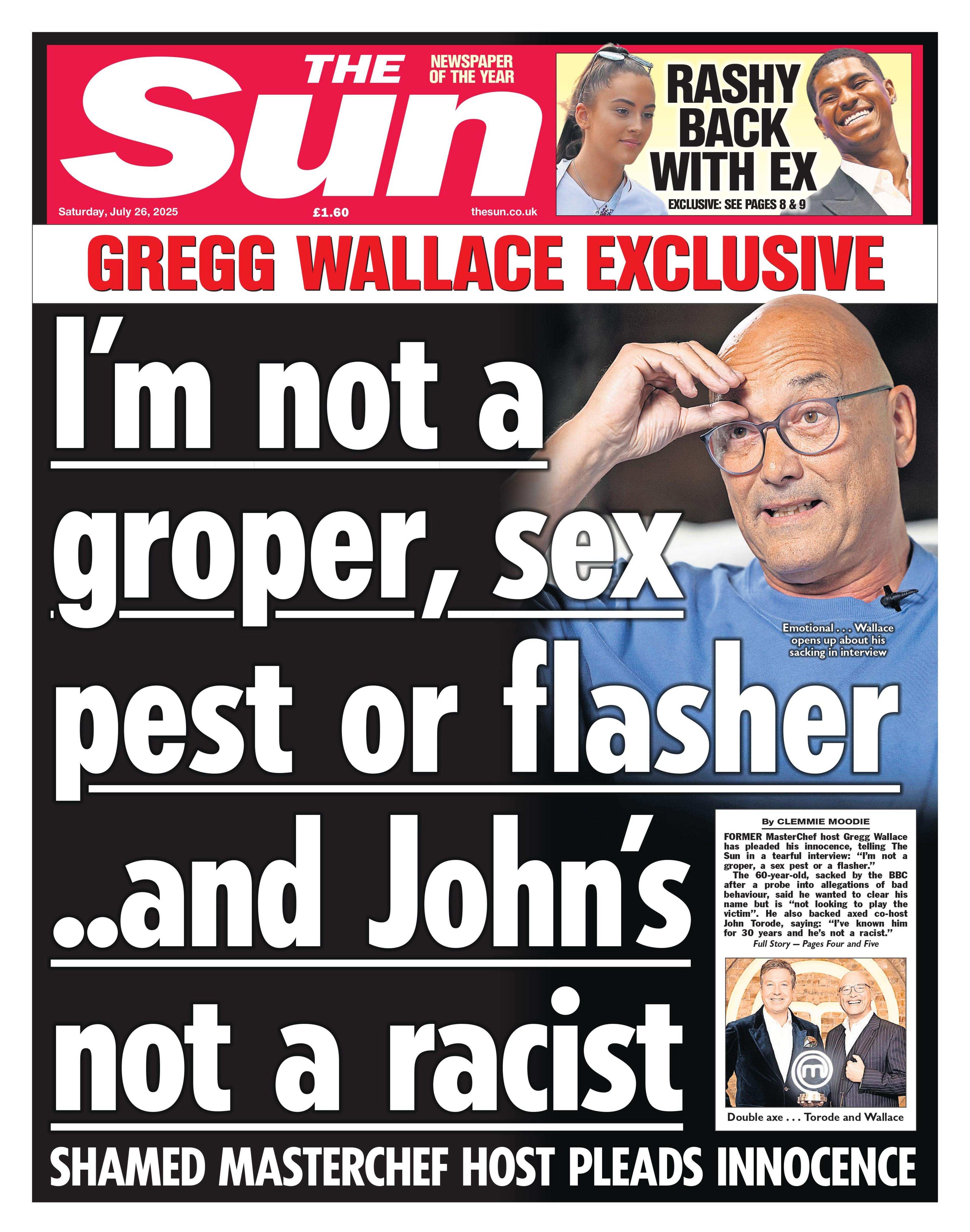 Former MasterChef presenter Gregg Wallace wears a blue shirt and silver spectacles and touches his brow as he speaks. 