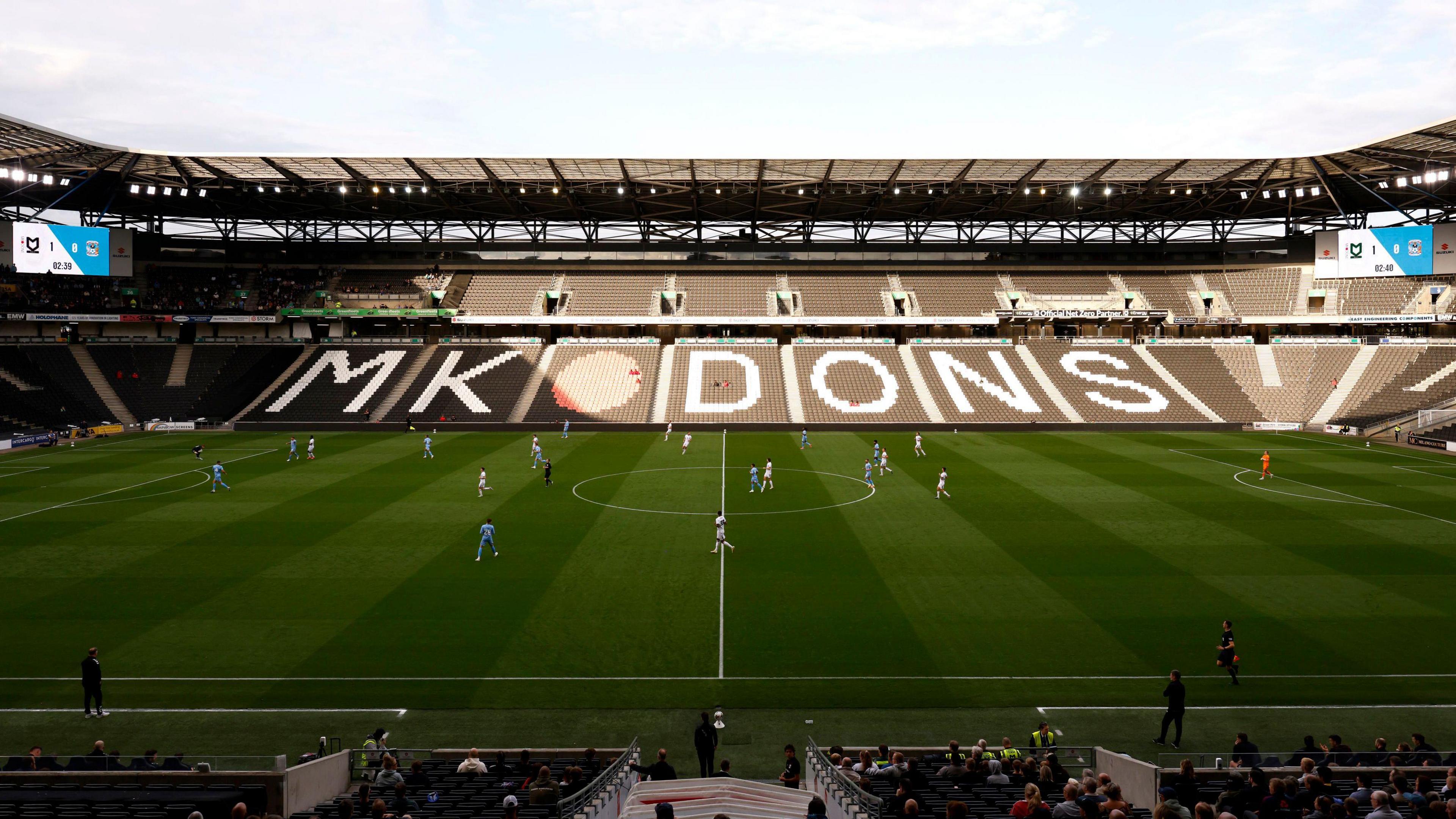 Stadium MK with MK Dons written in the seating