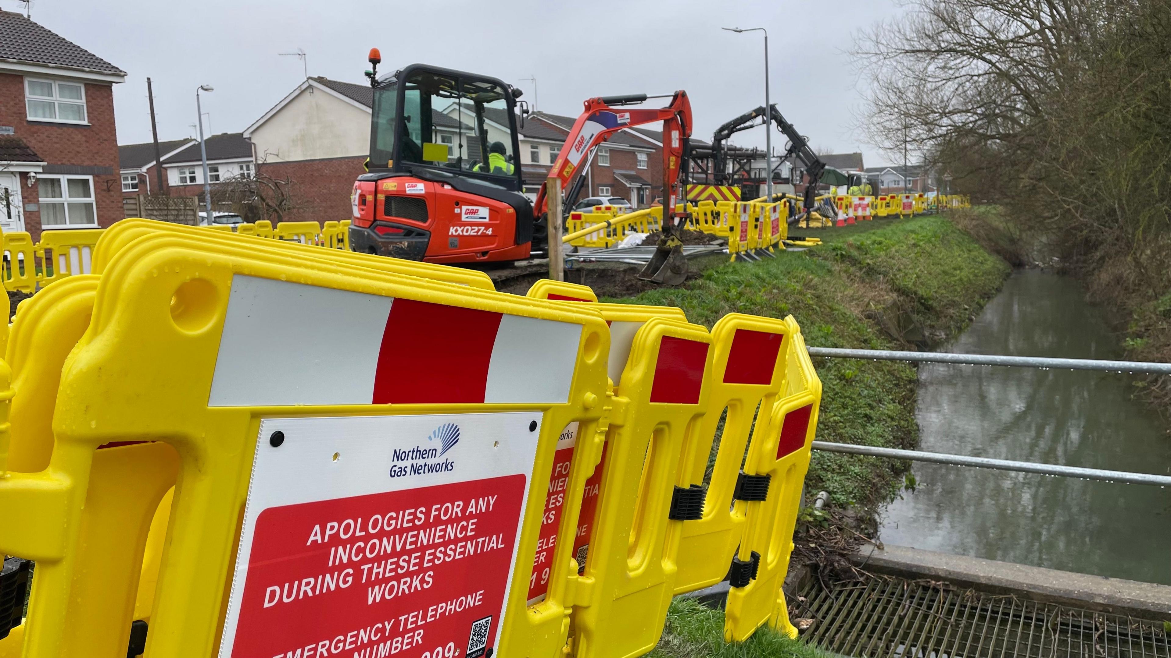 Gas engineers working to fix the damaged pipe