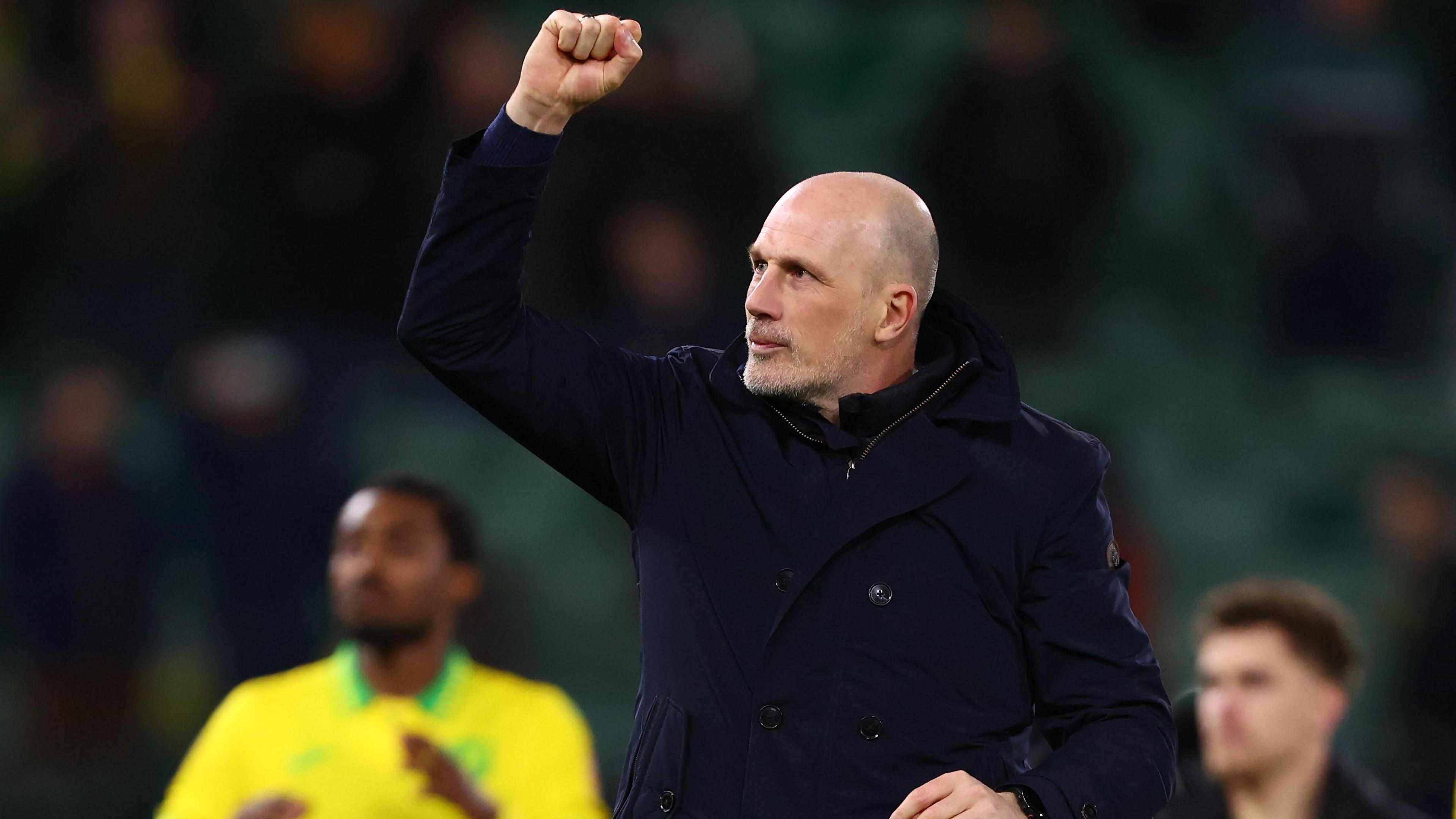 Philippe Clement punching the air to Norwich fans after their win over Sheffield United