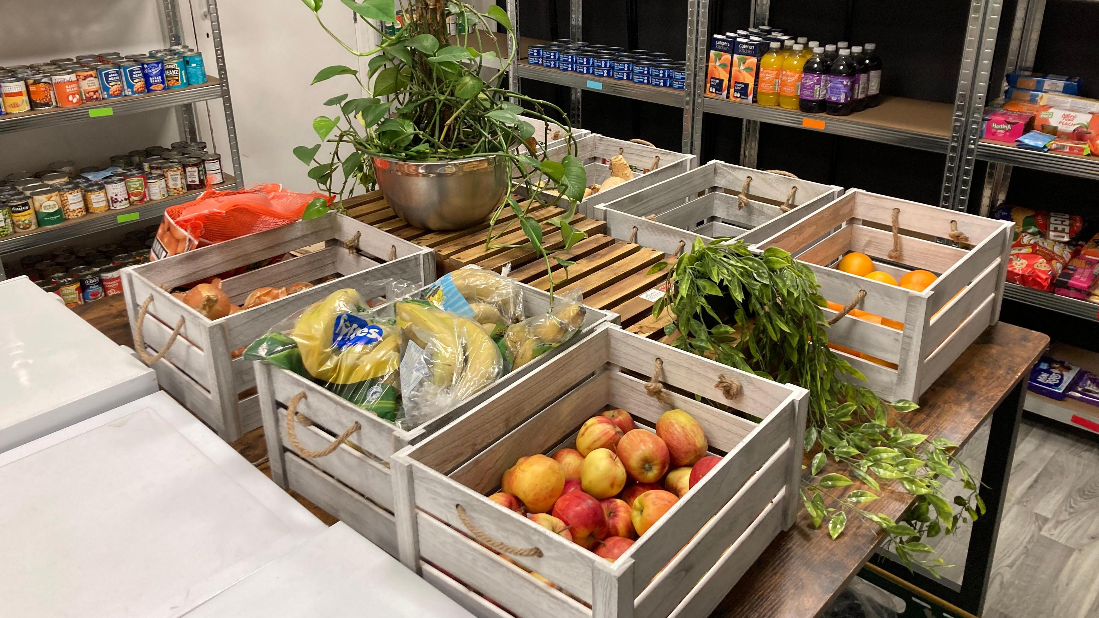 Crates of fruit and vegetables on a table