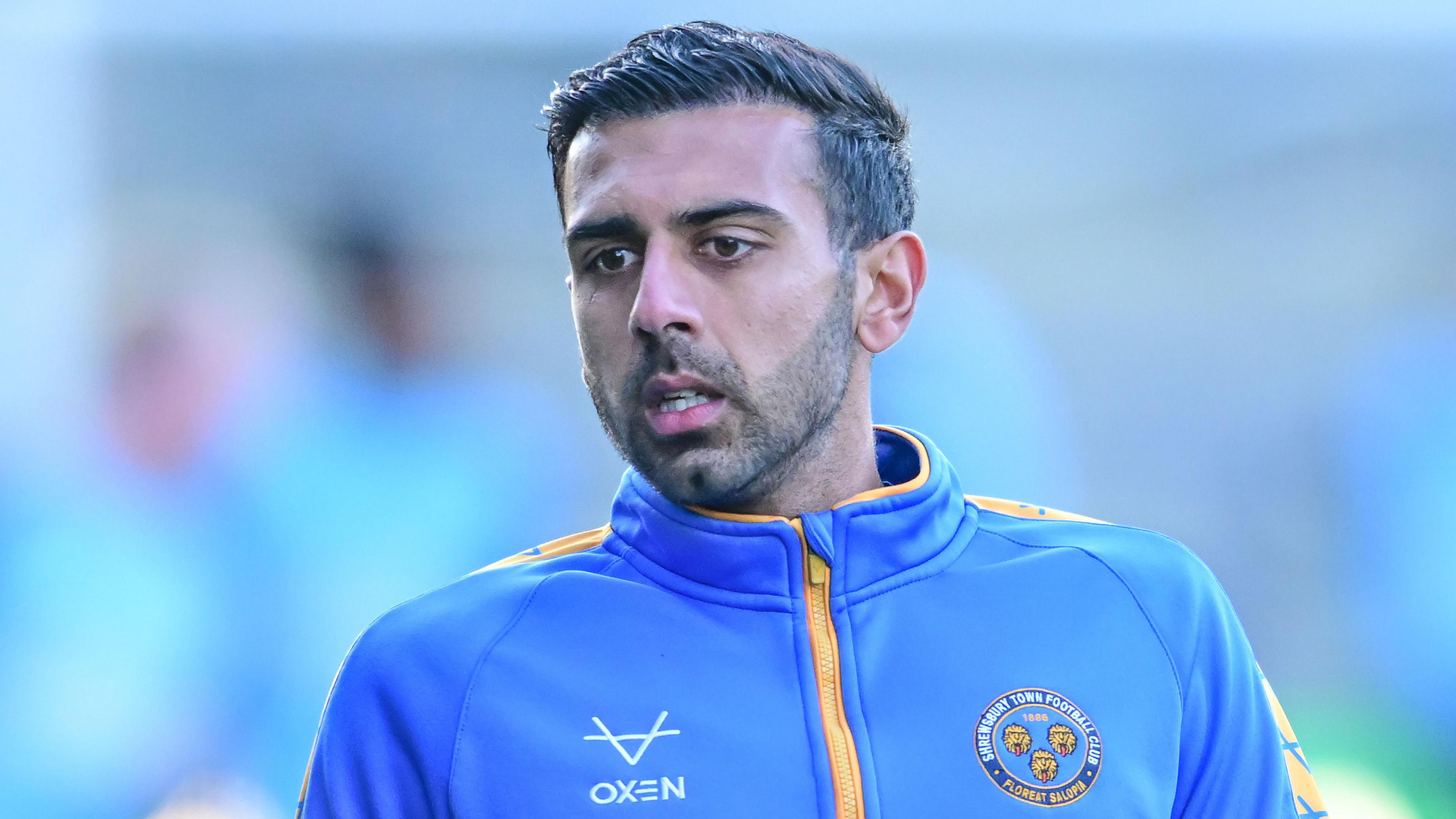 Mal Benning warms up for Shrewsbury Town 