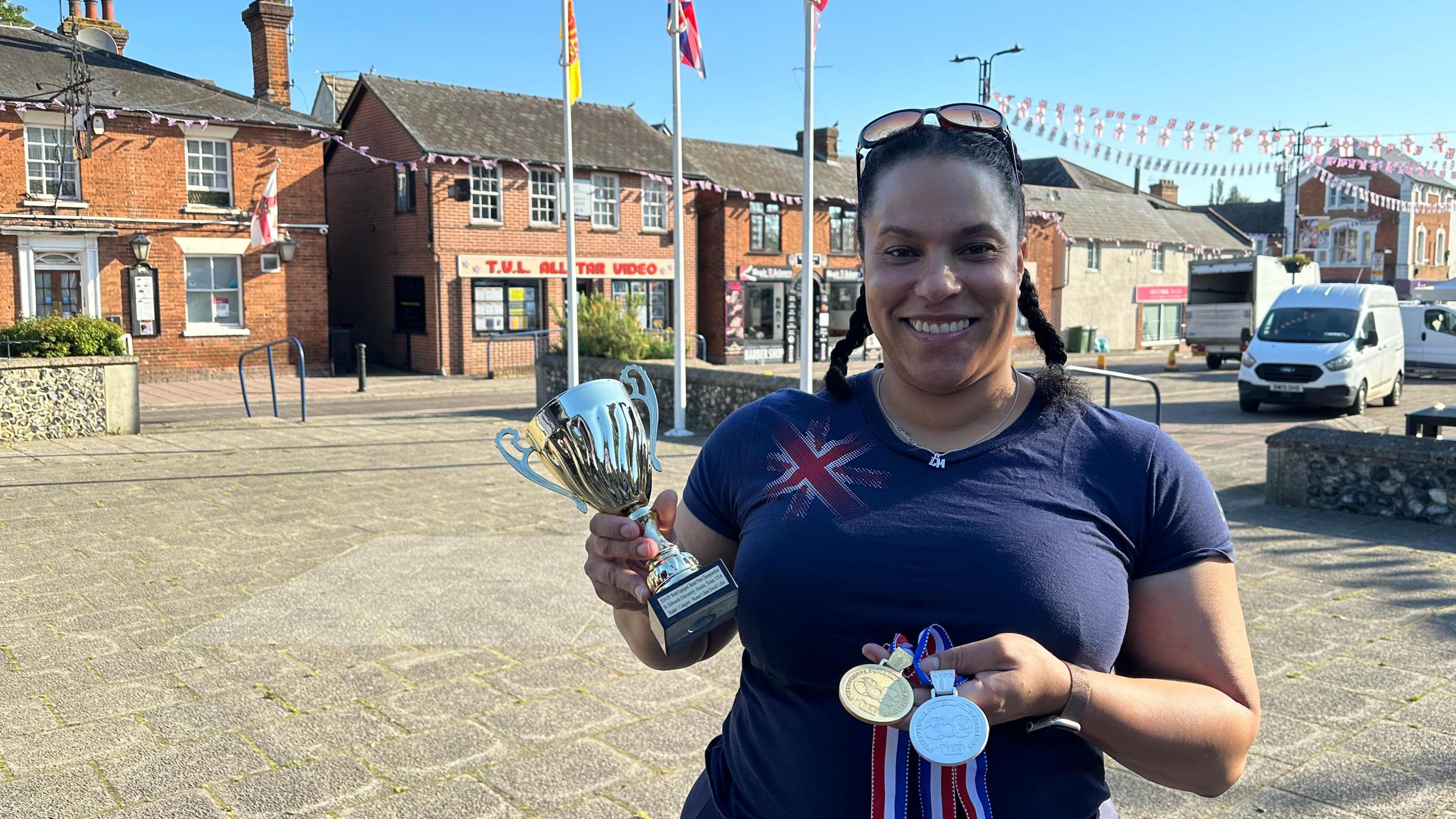 Powelifter Siobhan Taylor out for Suffolk Day with her medals