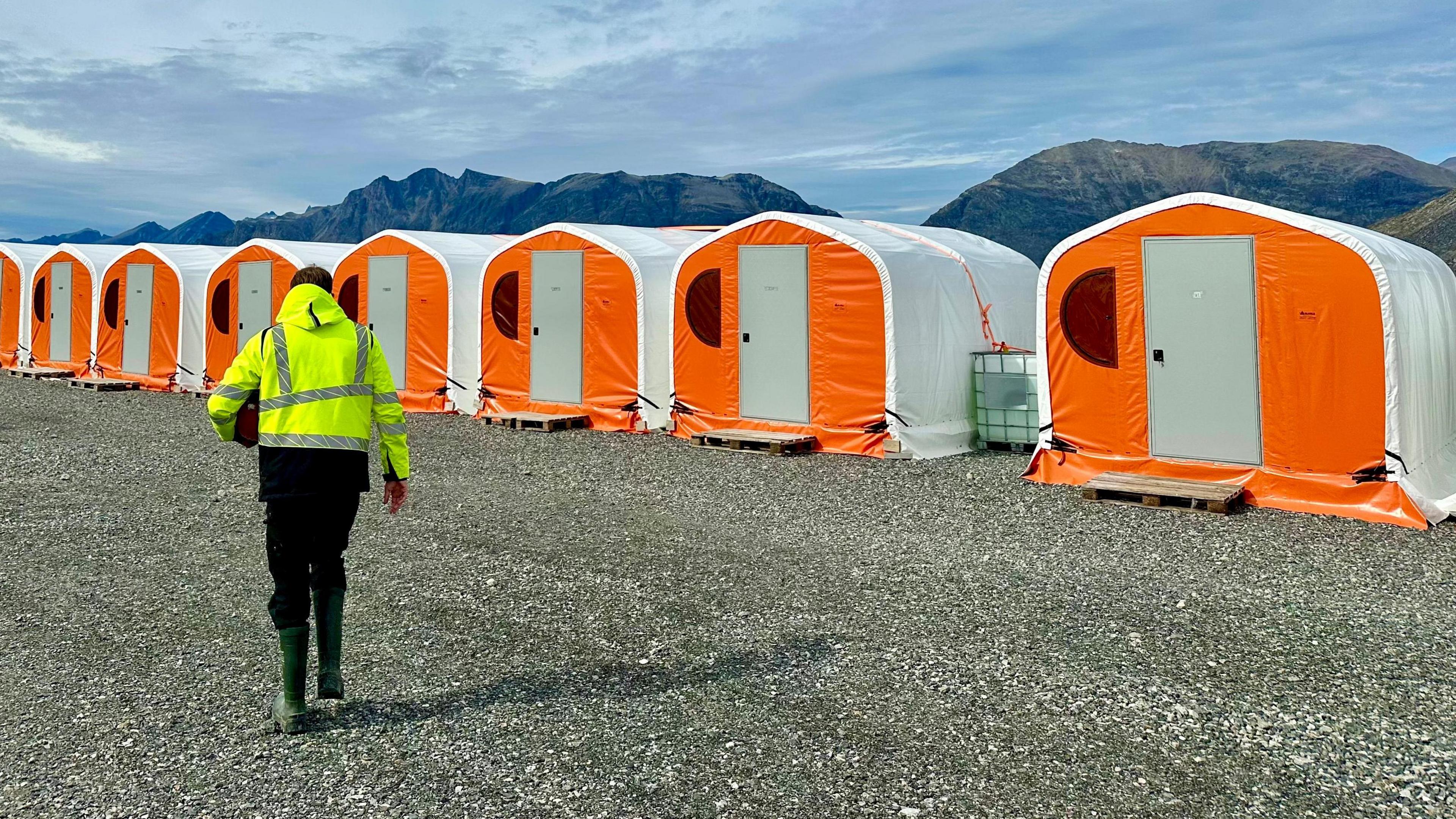 Orange and white coloured accommodation tents at the Nalunaq mine