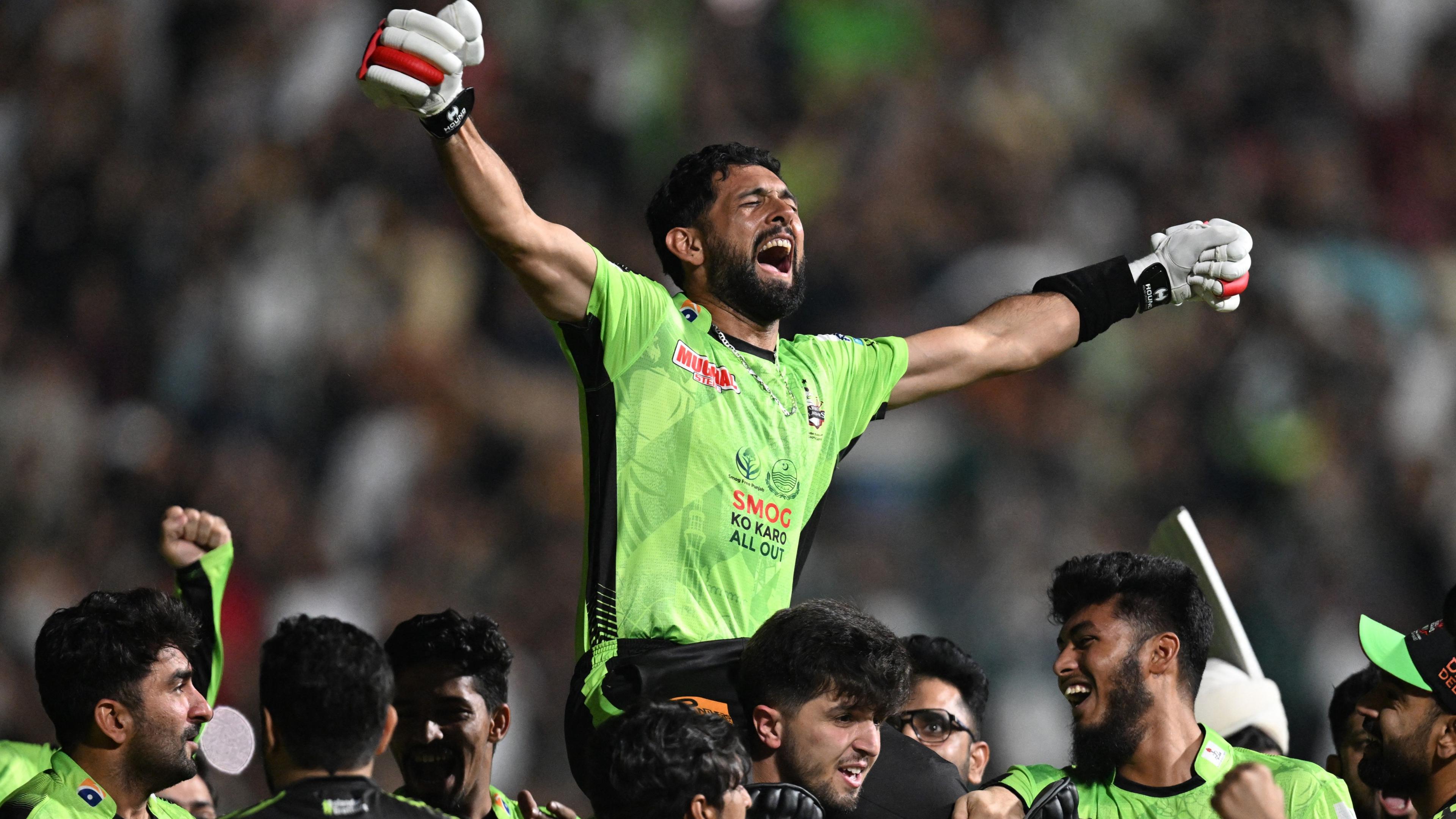 Sikandar Raza celebrates