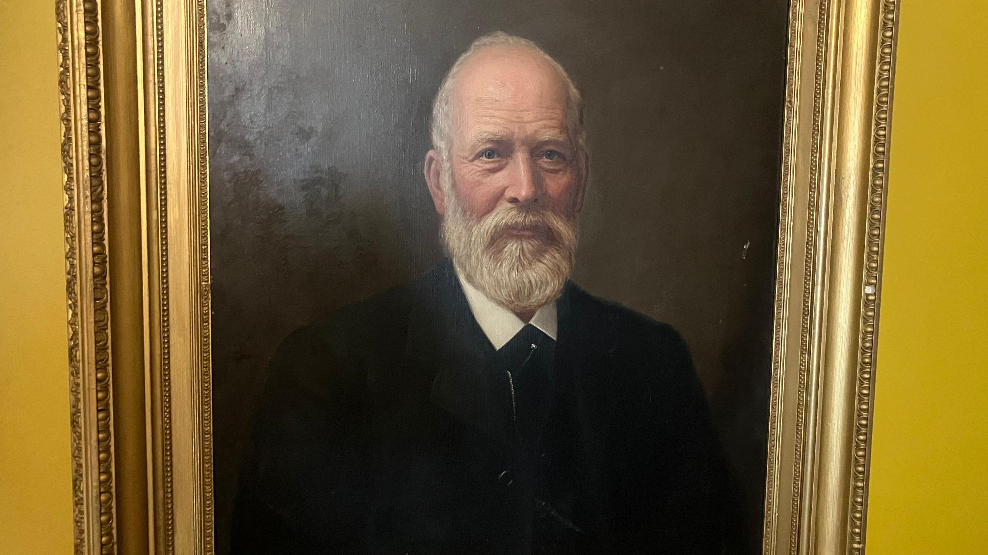 Old portrait of a man with bald head and grey beard