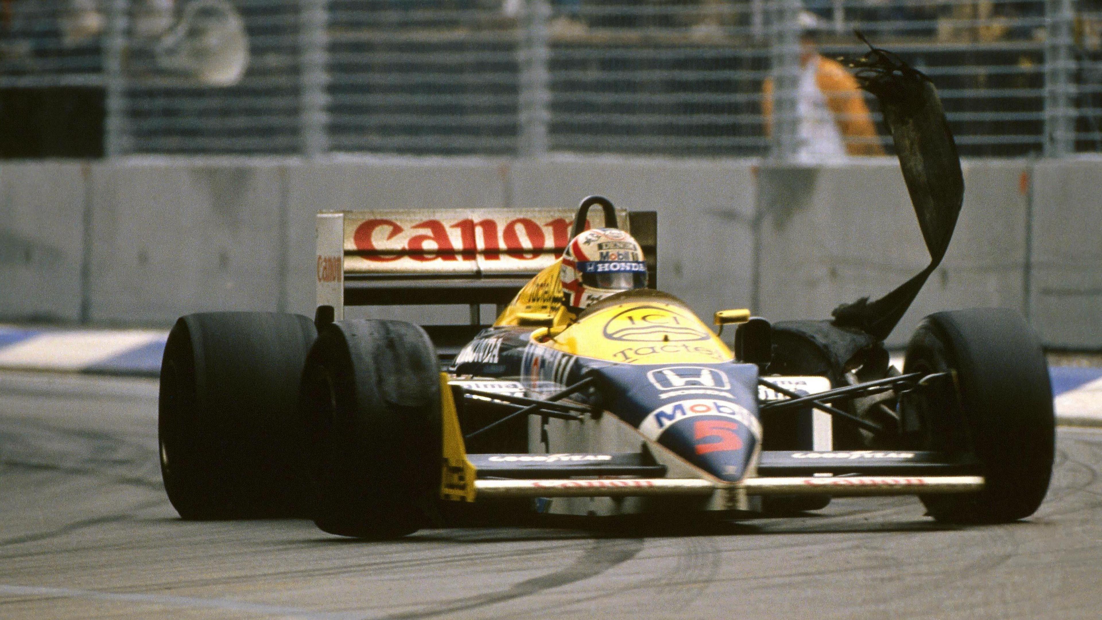 Nigel Mansell's left rear tyre flaps as he attempts to bring his Williams under control at the 1986 Australian Grand Prix