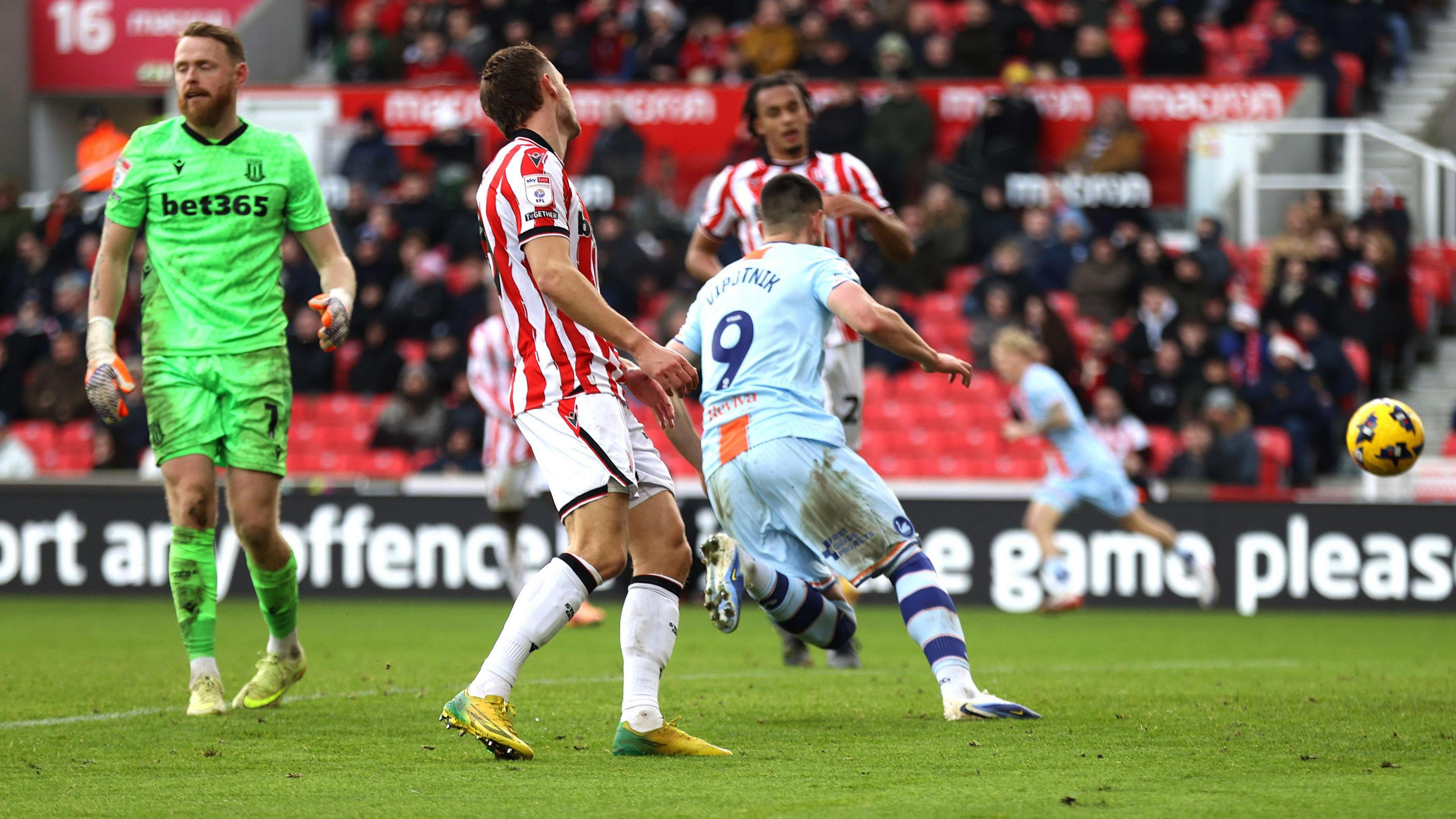 Zan Vipotnik turns to celebrate after scoring