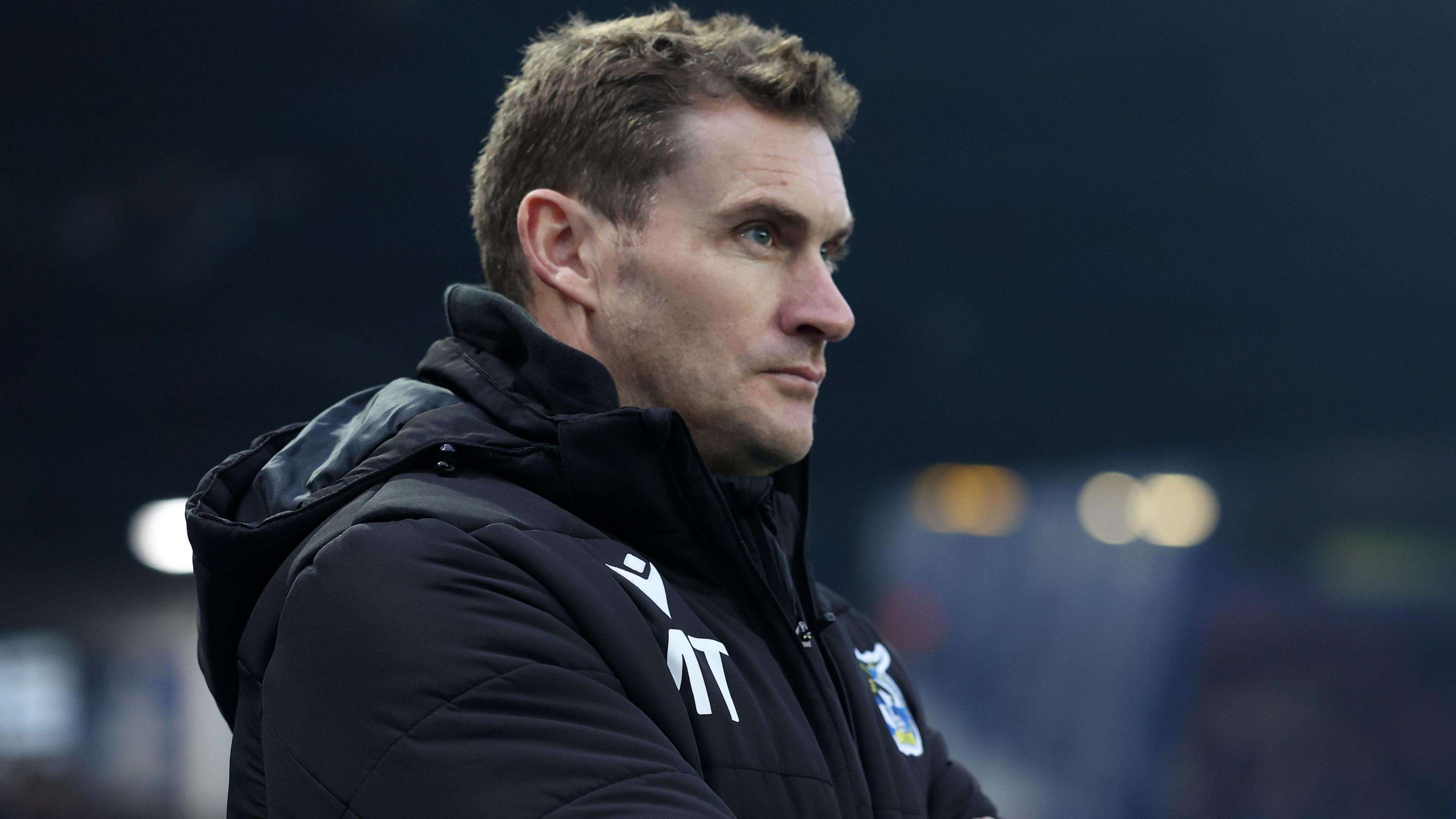 Matt Taylor watches on from the sidelines during his time as Bristol City boss